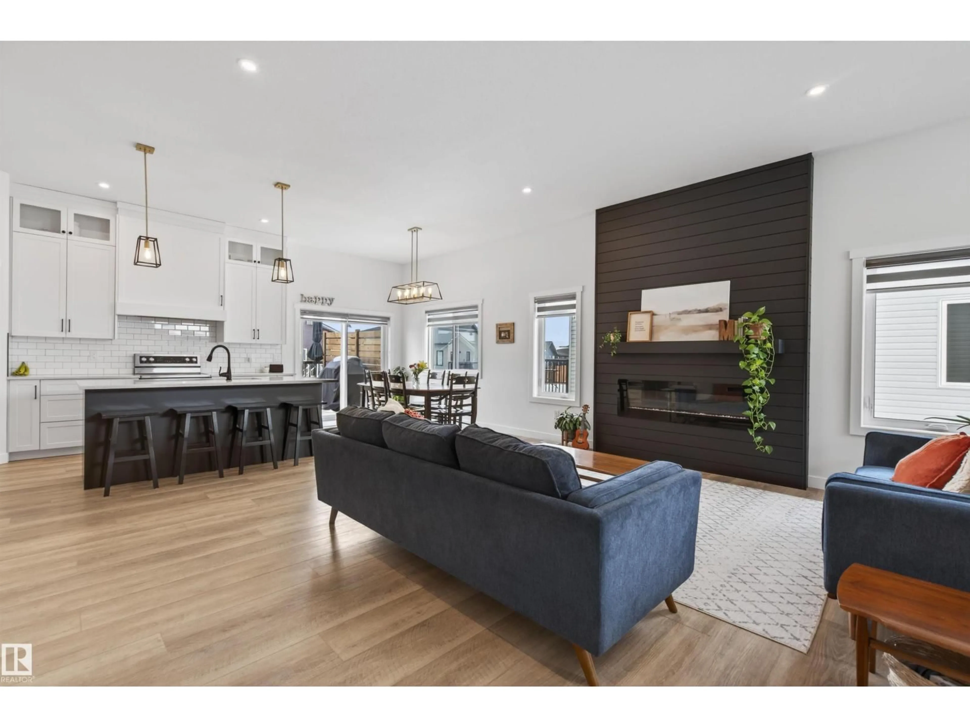 Open concept kitchen, wood/laminate floor for 318 FUNDY WY, Cold Lake Alberta T9M0M4