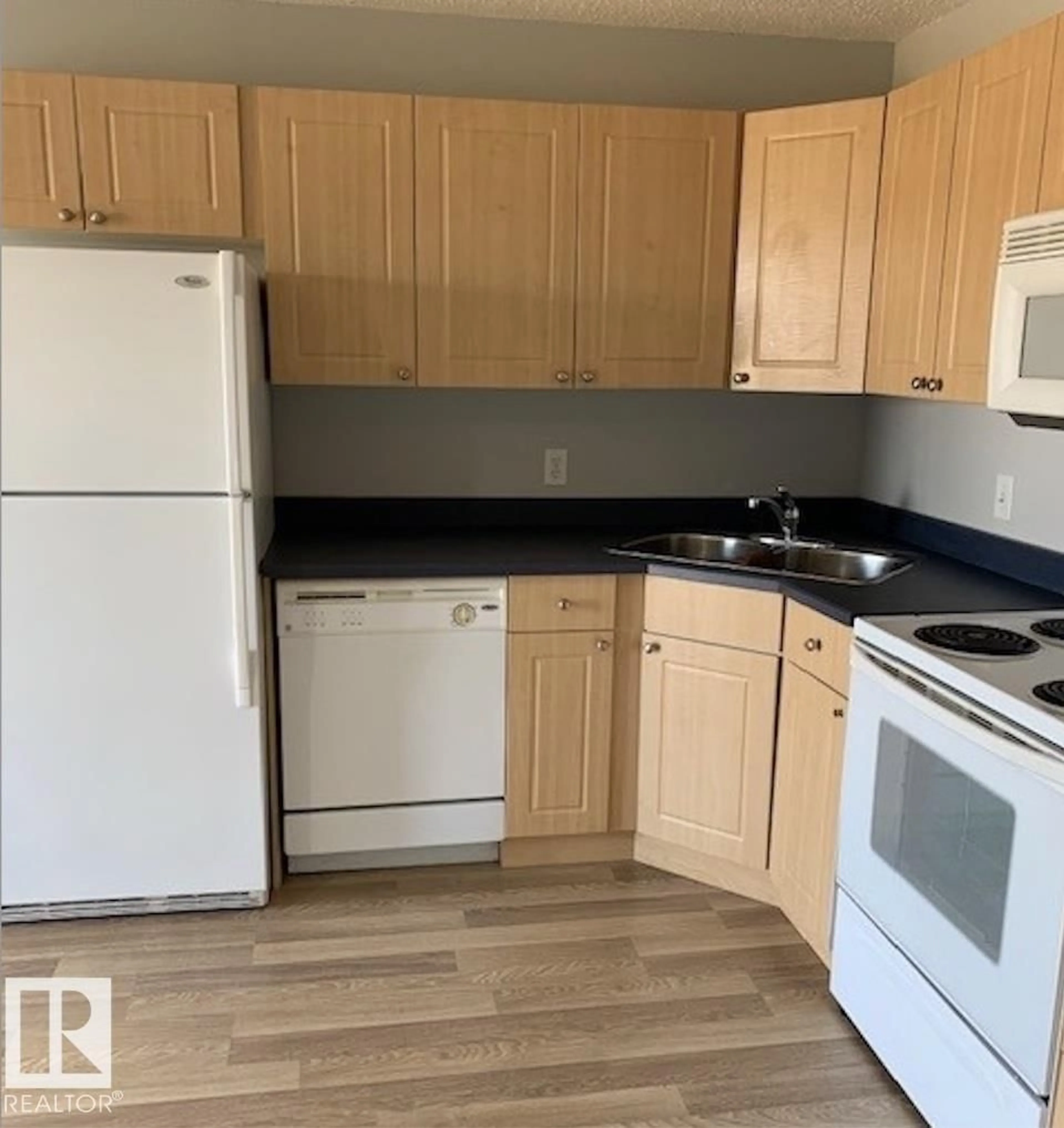 Standard kitchen, wood/laminate floor for 70 - 207 WOODSMERE, Fort Saskatchewan Alberta T8L4R8