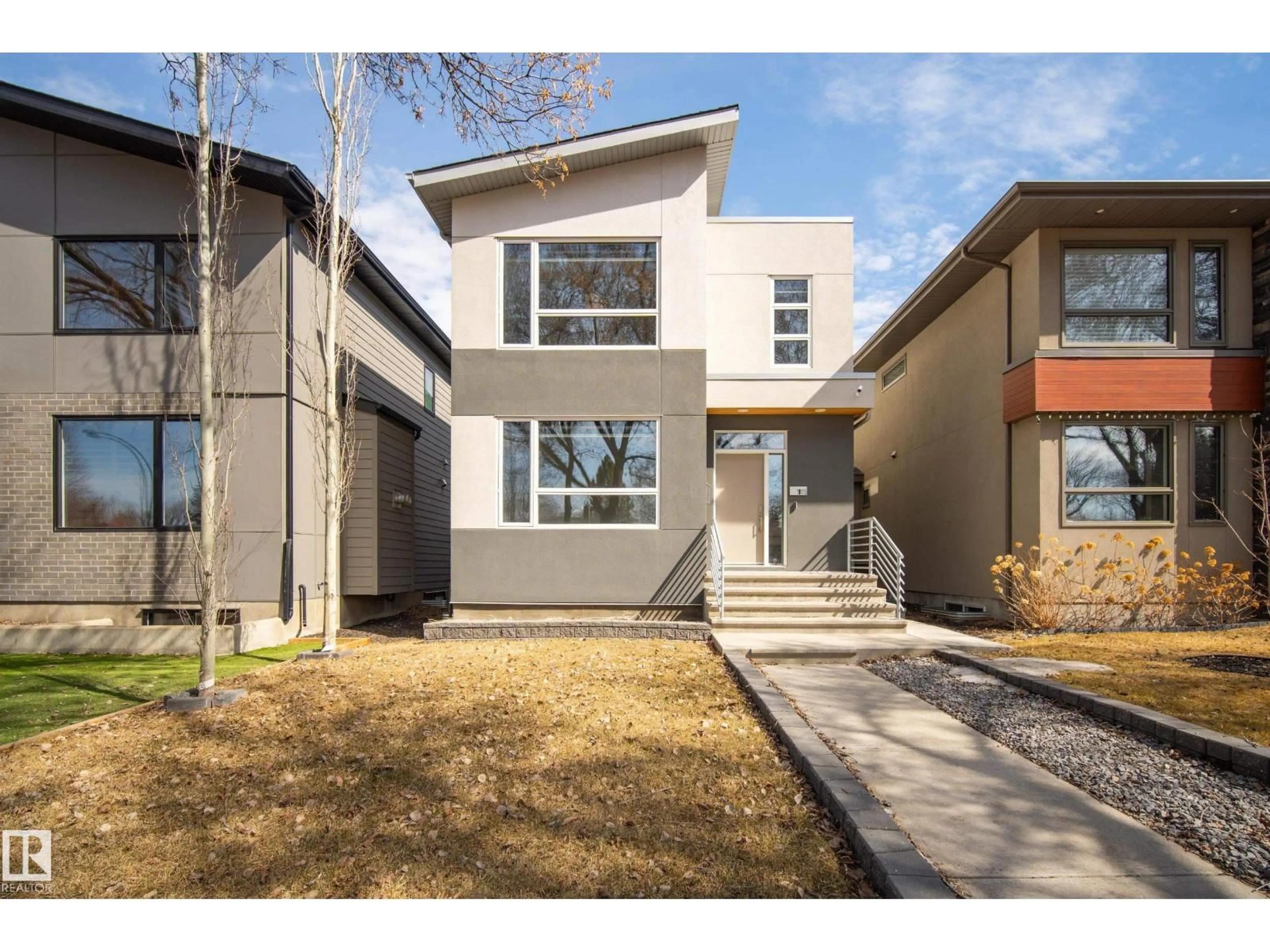 Home with brick exterior material, street for NW - 10115 83 ST, Edmonton Alberta T6A3N5