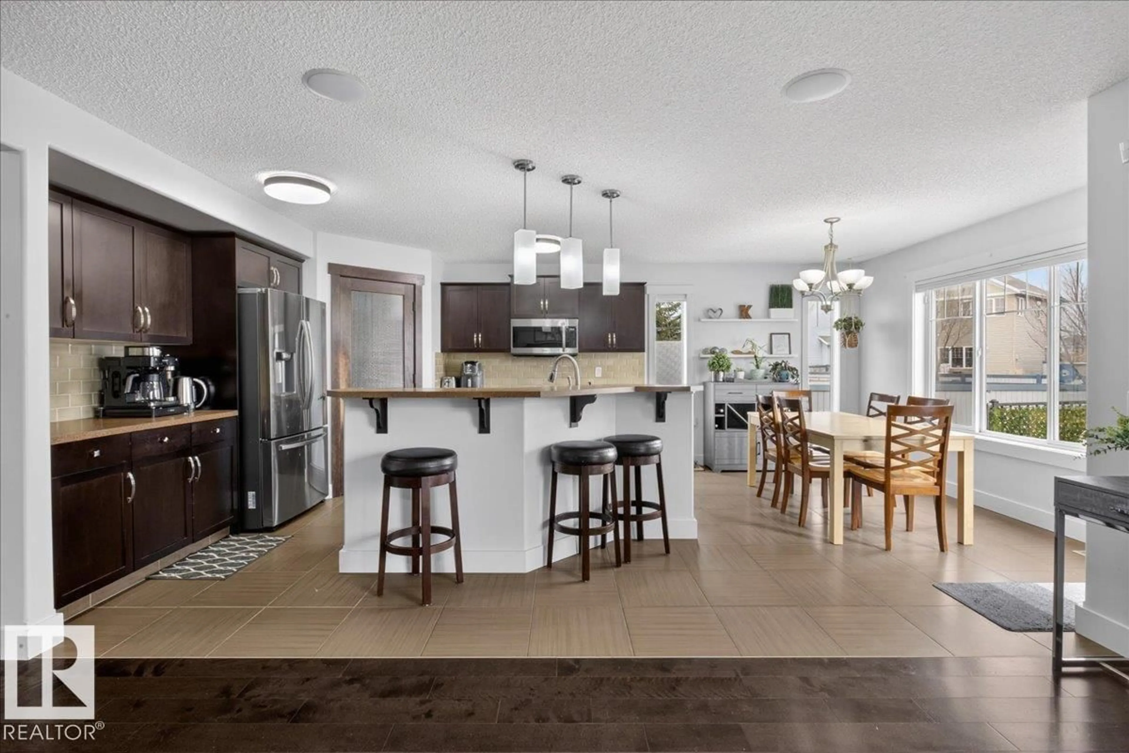 Open concept kitchen, ceramic/tile floor for SW - 8132 16A AV, Edmonton Alberta T6X0H8