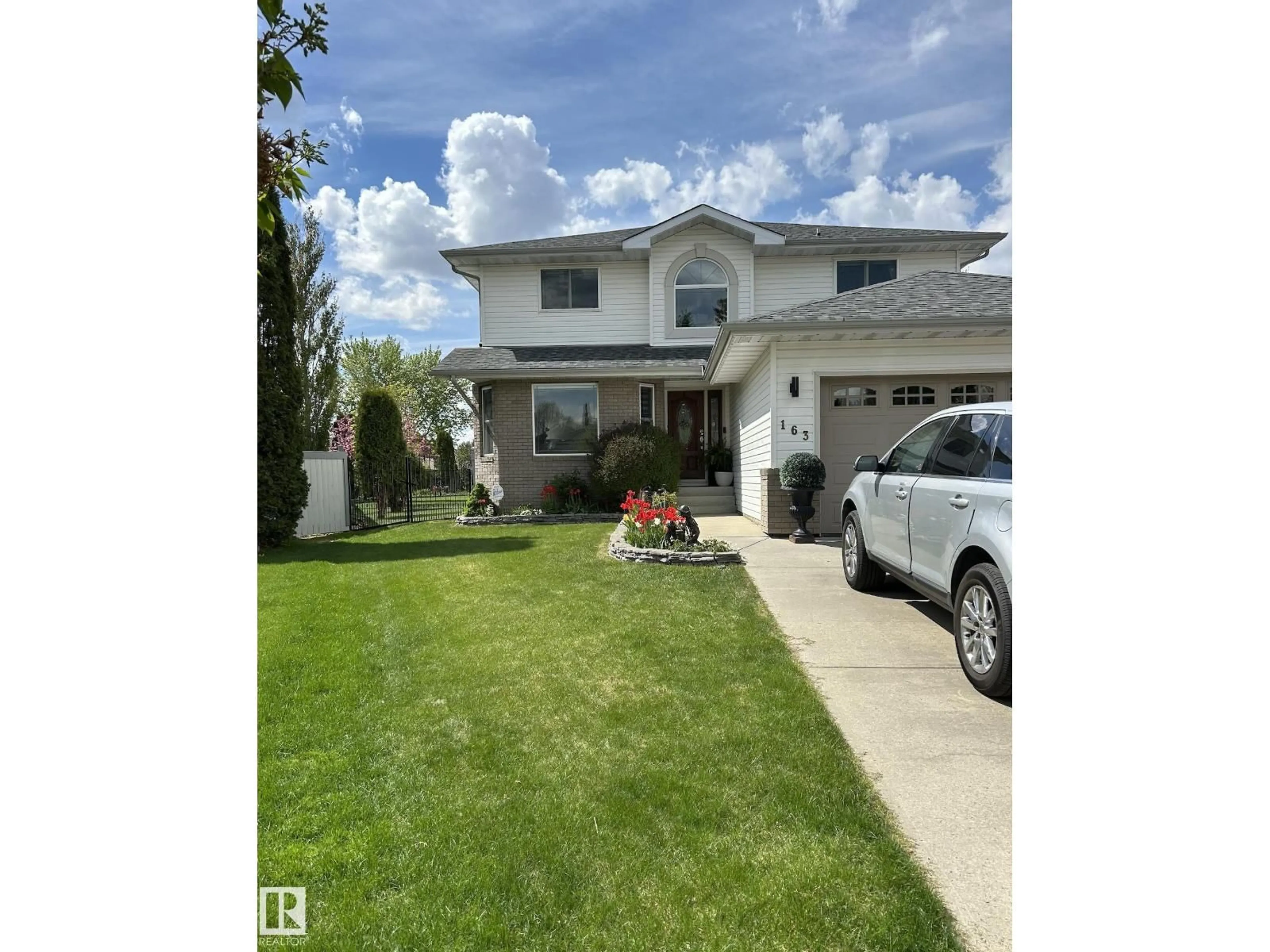 Home with vinyl exterior material, street for 163 HIGHLAND WY, Sherwood Park Alberta T8A5R2