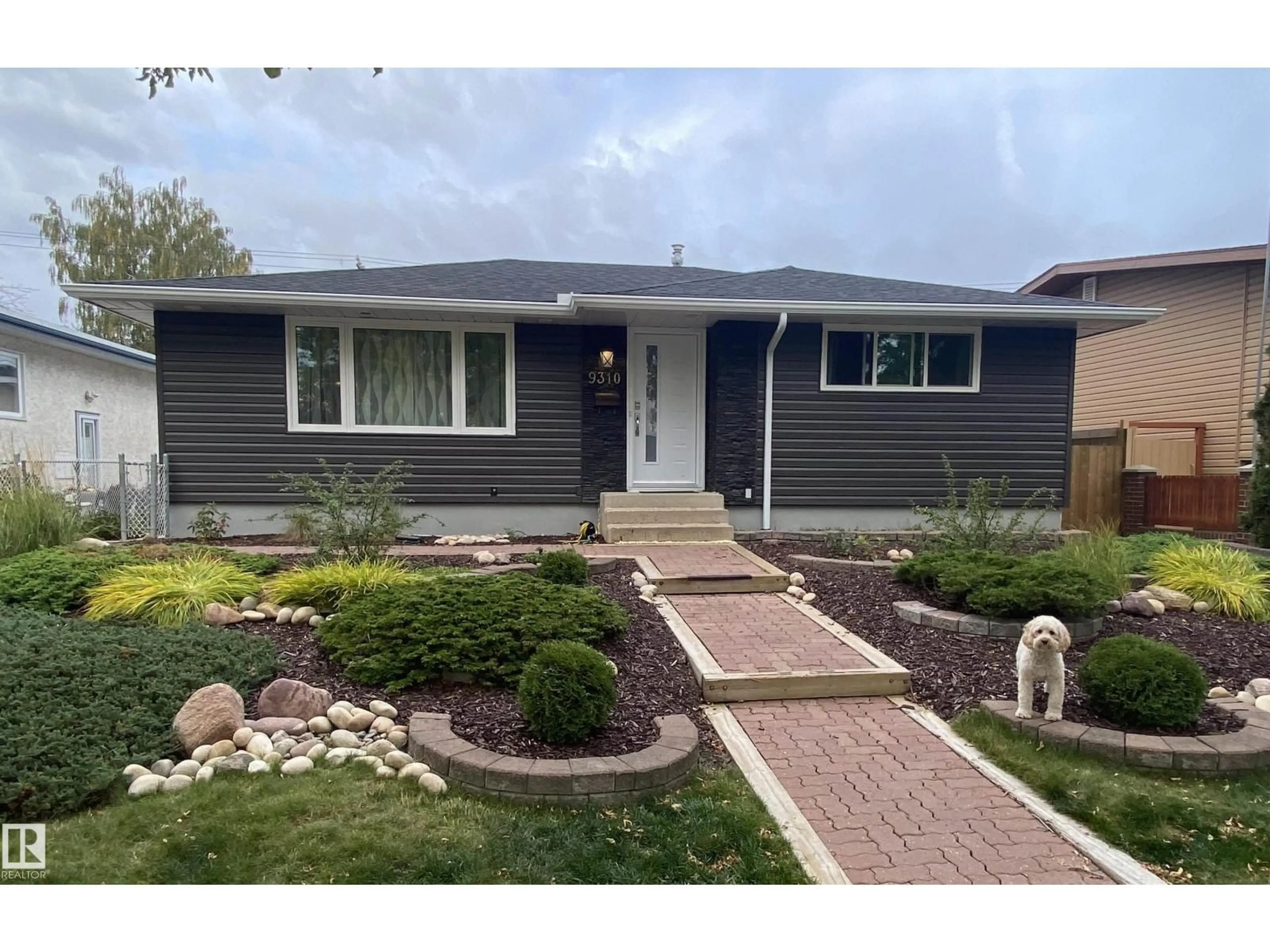 Home with brick exterior material, street for 9310 165 ST, Edmonton Alberta T5R2S4