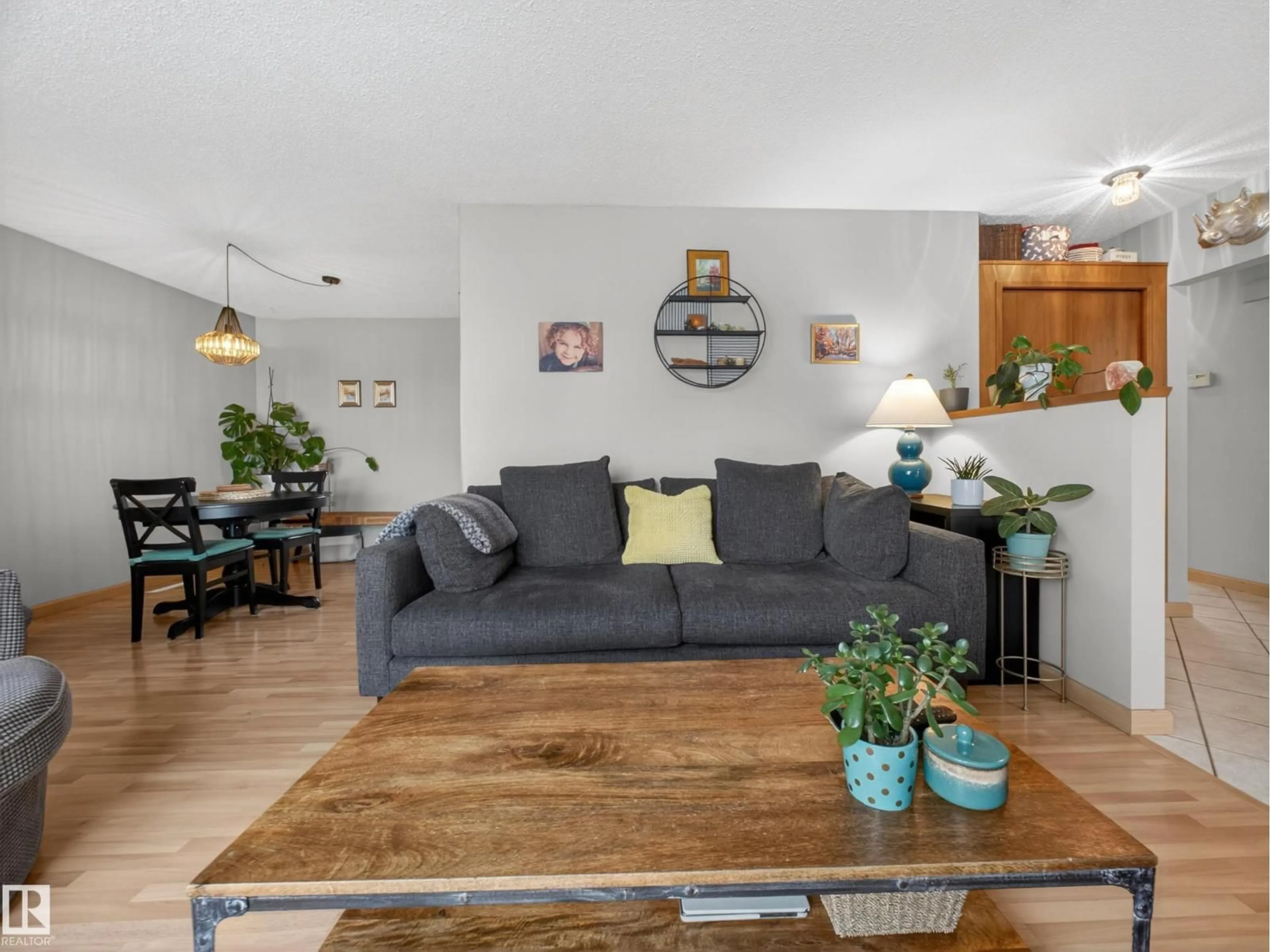 Living room with furniture, wood/laminate floor for 9310 165 ST, Edmonton Alberta T5R2S4