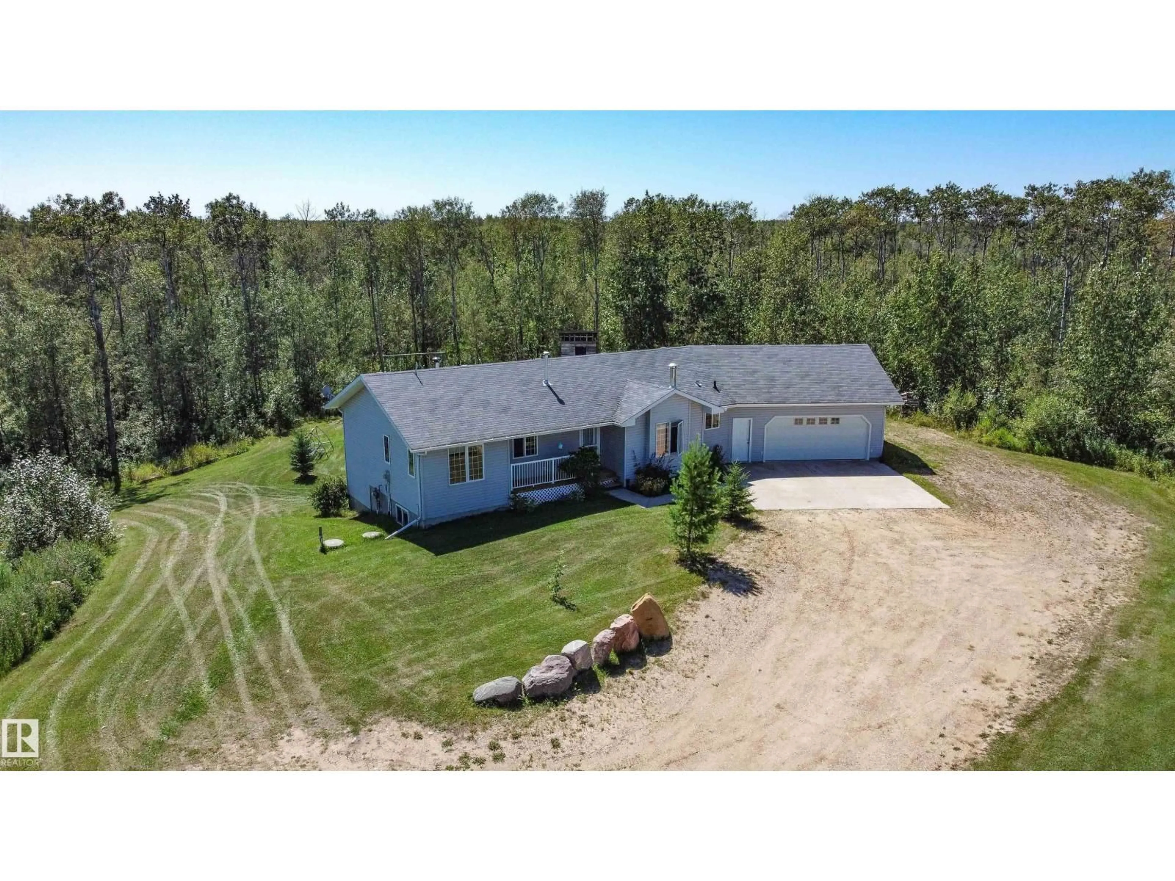 A pic from outside/outdoor area/front of a property/back of a property/a pic from drone, unknown for 51129 - 24 RR 201, Rural Beaver County Alberta T0B4J1