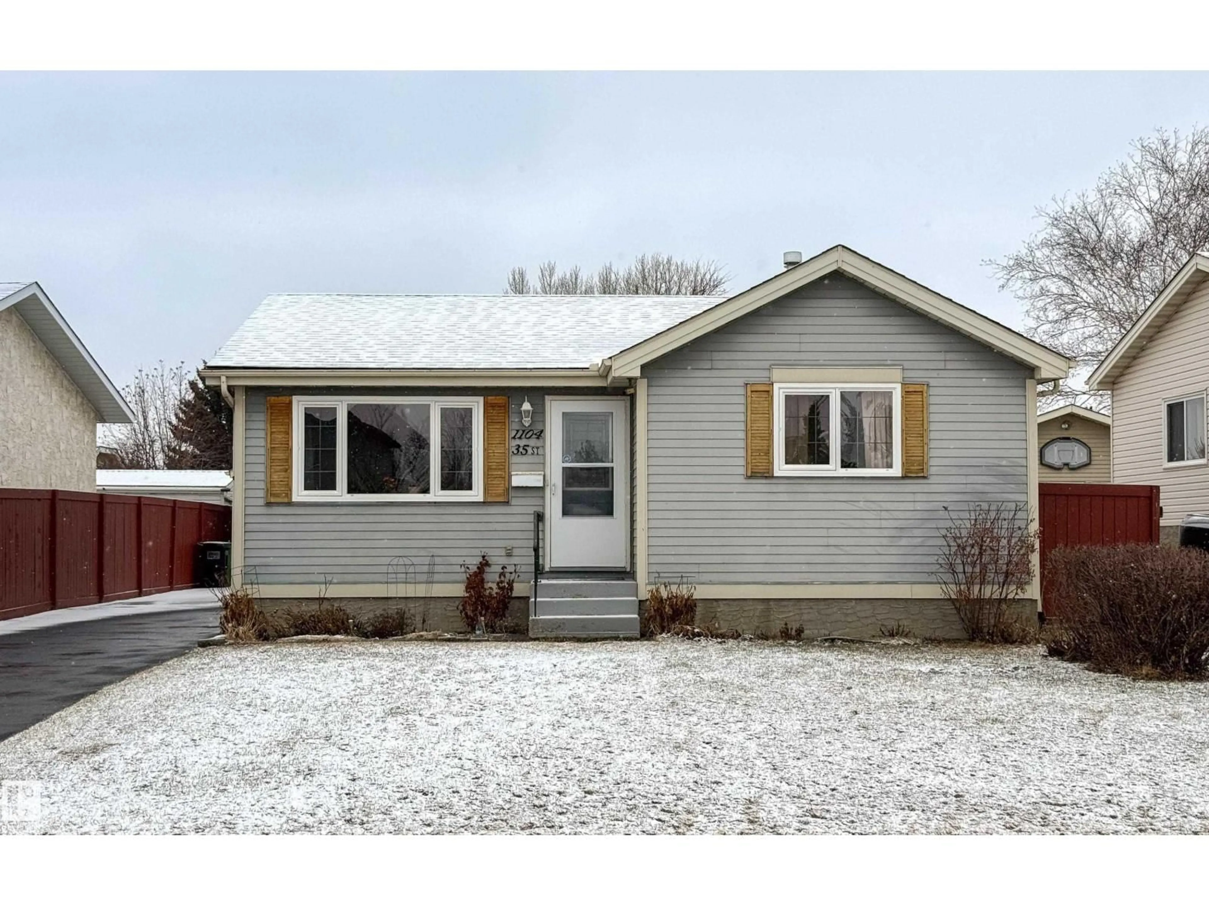 Home with vinyl exterior material, street for NW - 1104 35 ST, Edmonton Alberta T6L3E7