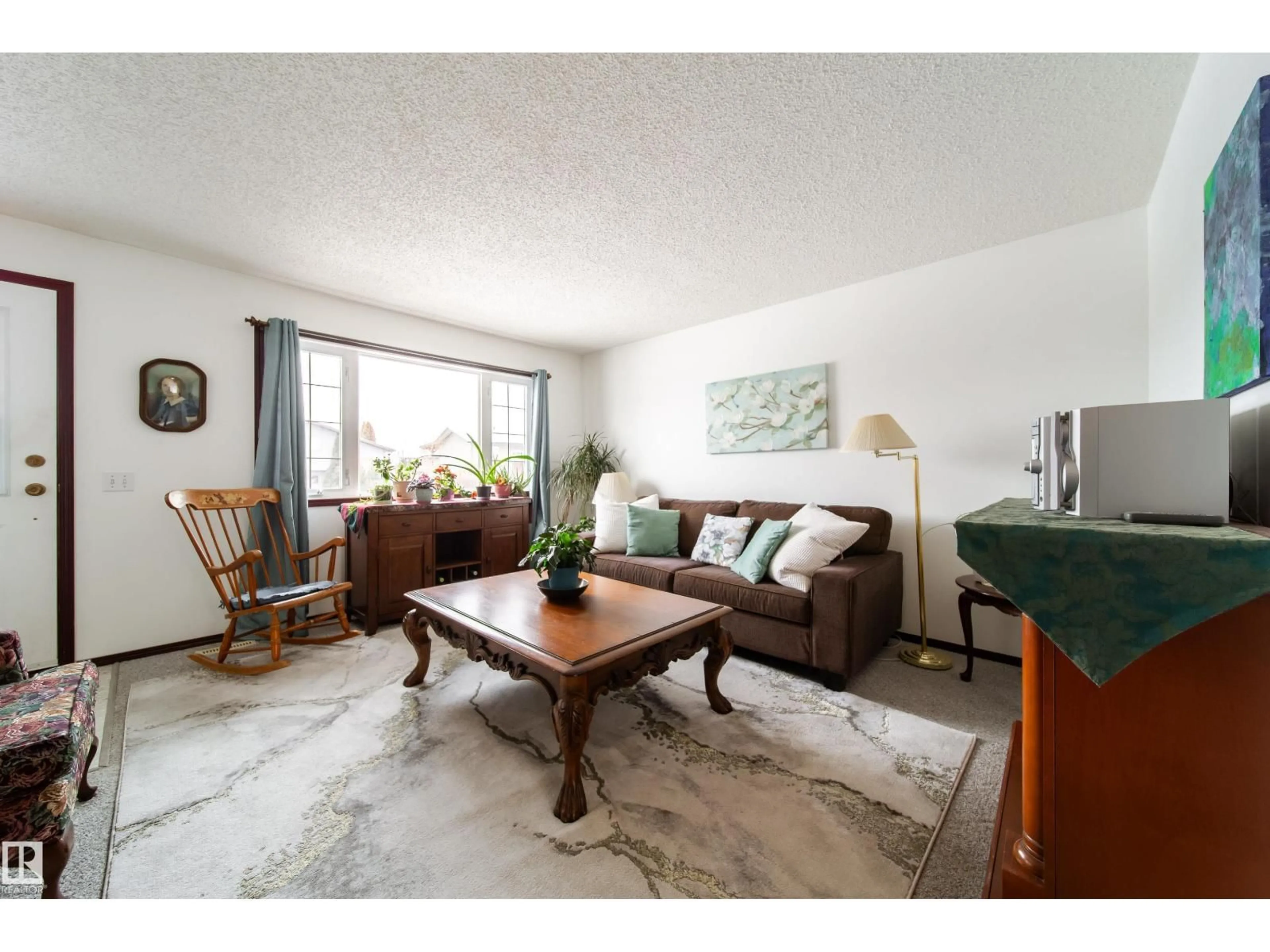 Living room with furniture, unknown for NW - 1104 35 ST, Edmonton Alberta T6L3E7