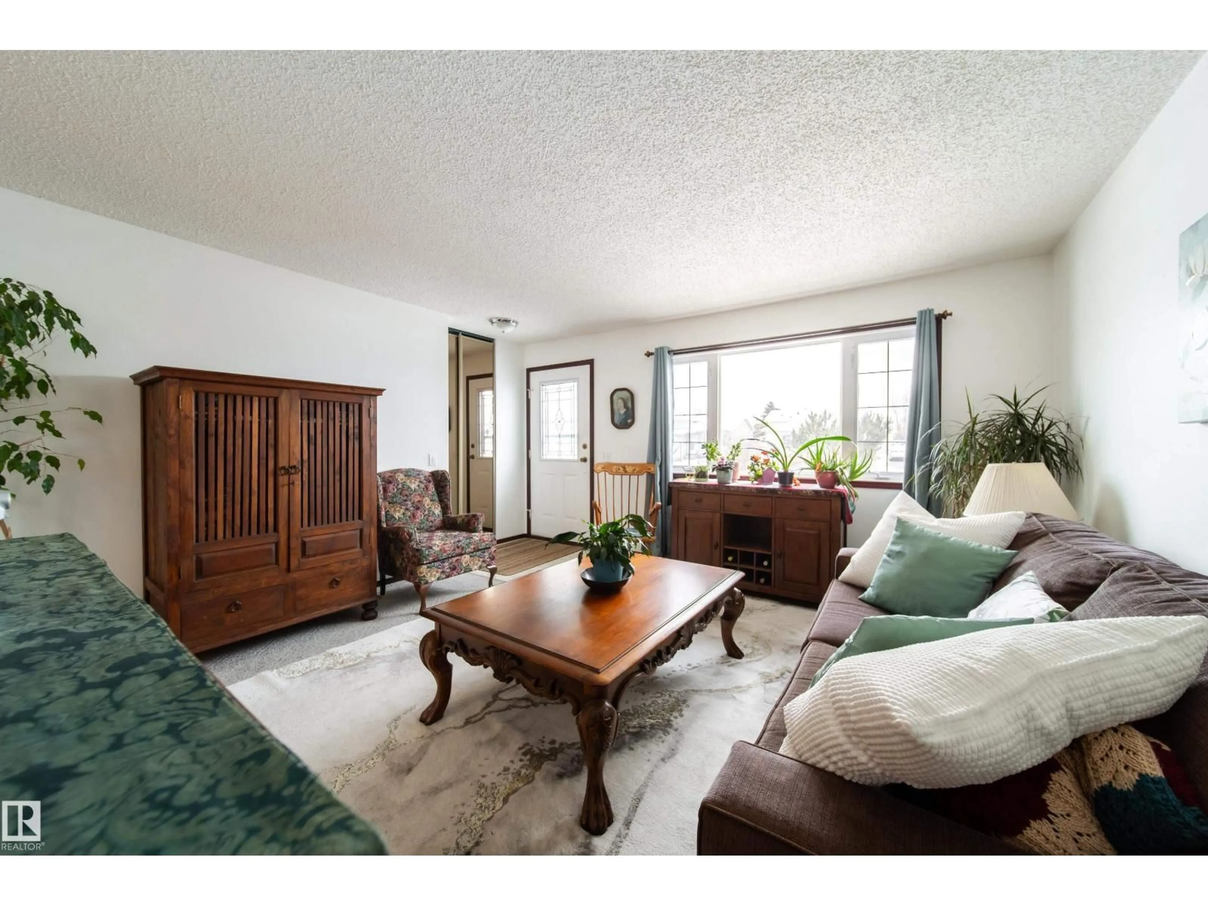 Living room with furniture, unknown for NW - 1104 35 ST, Edmonton Alberta T6L3E7