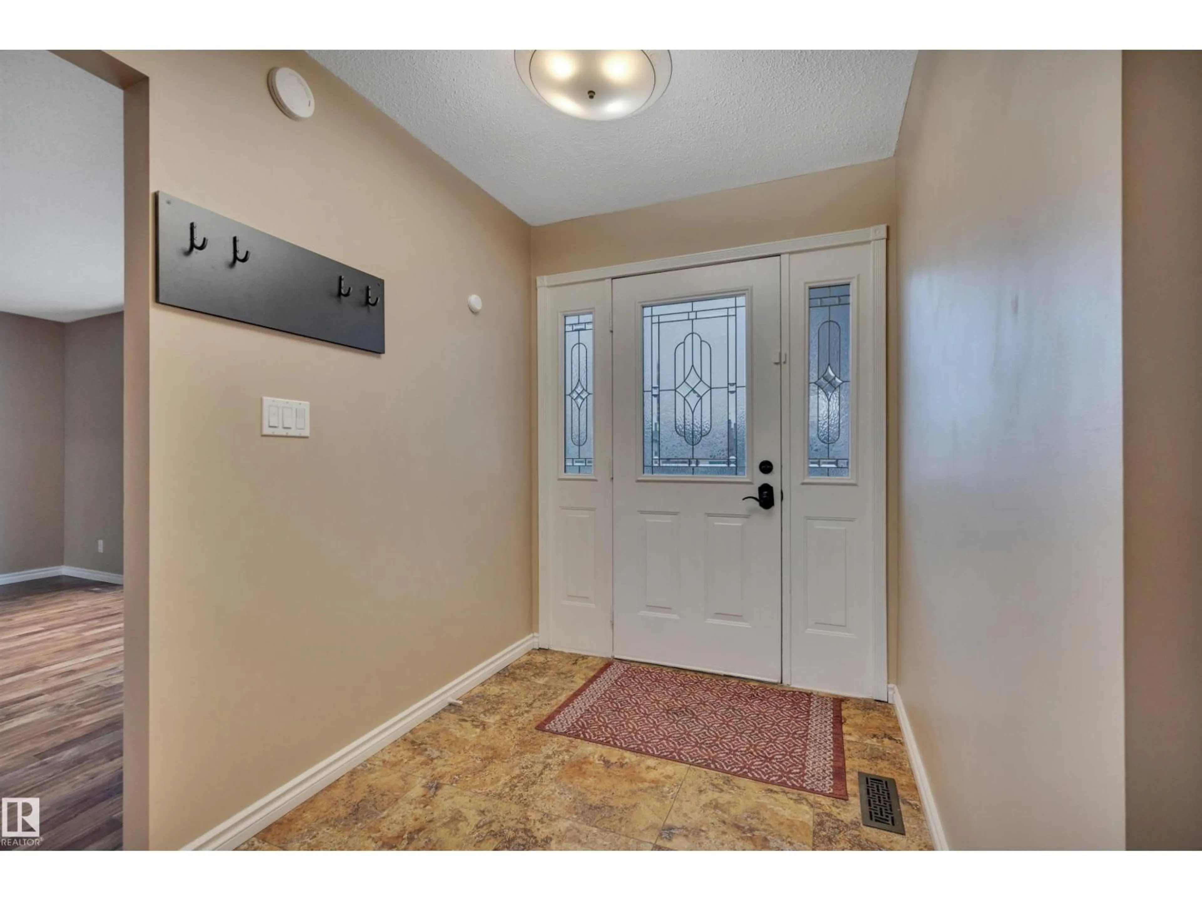 Indoor entryway for 10742 33A AV, Edmonton Alberta T6J3B7