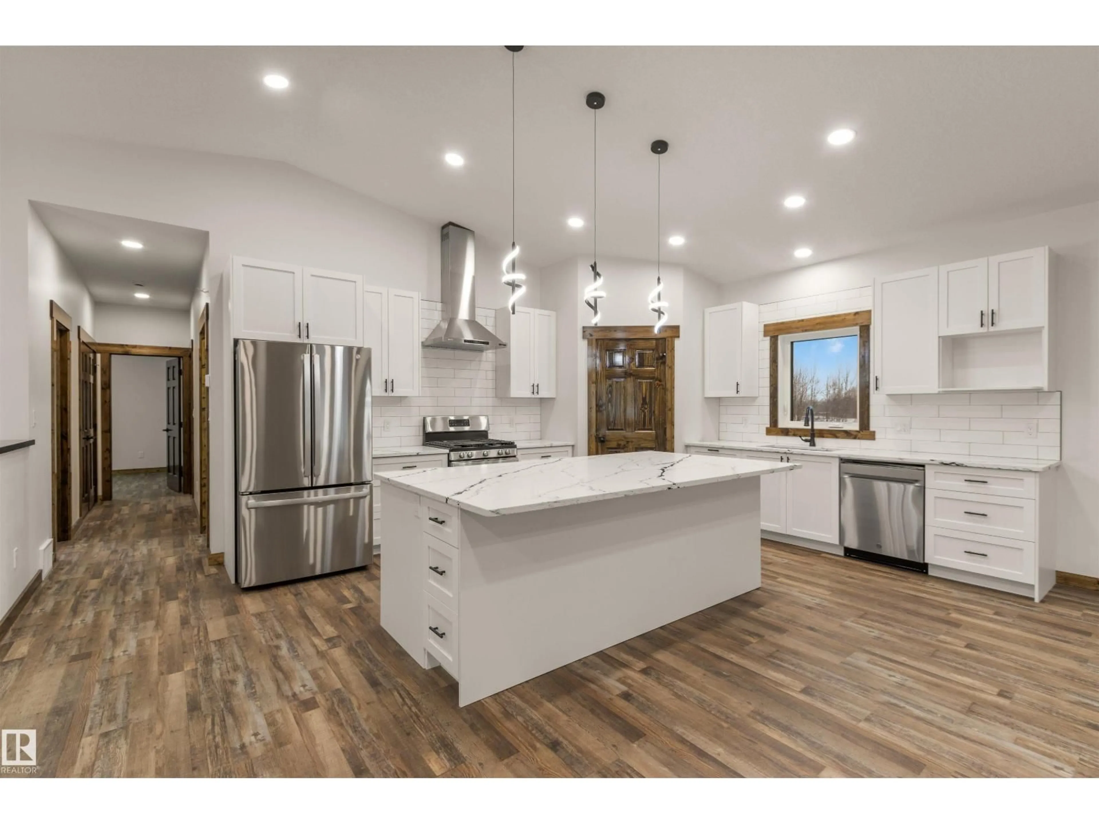 Open concept kitchen, wood/laminate floor for 8 RANGE RD 80, Rural Brazeau County Alberta T7A0C1