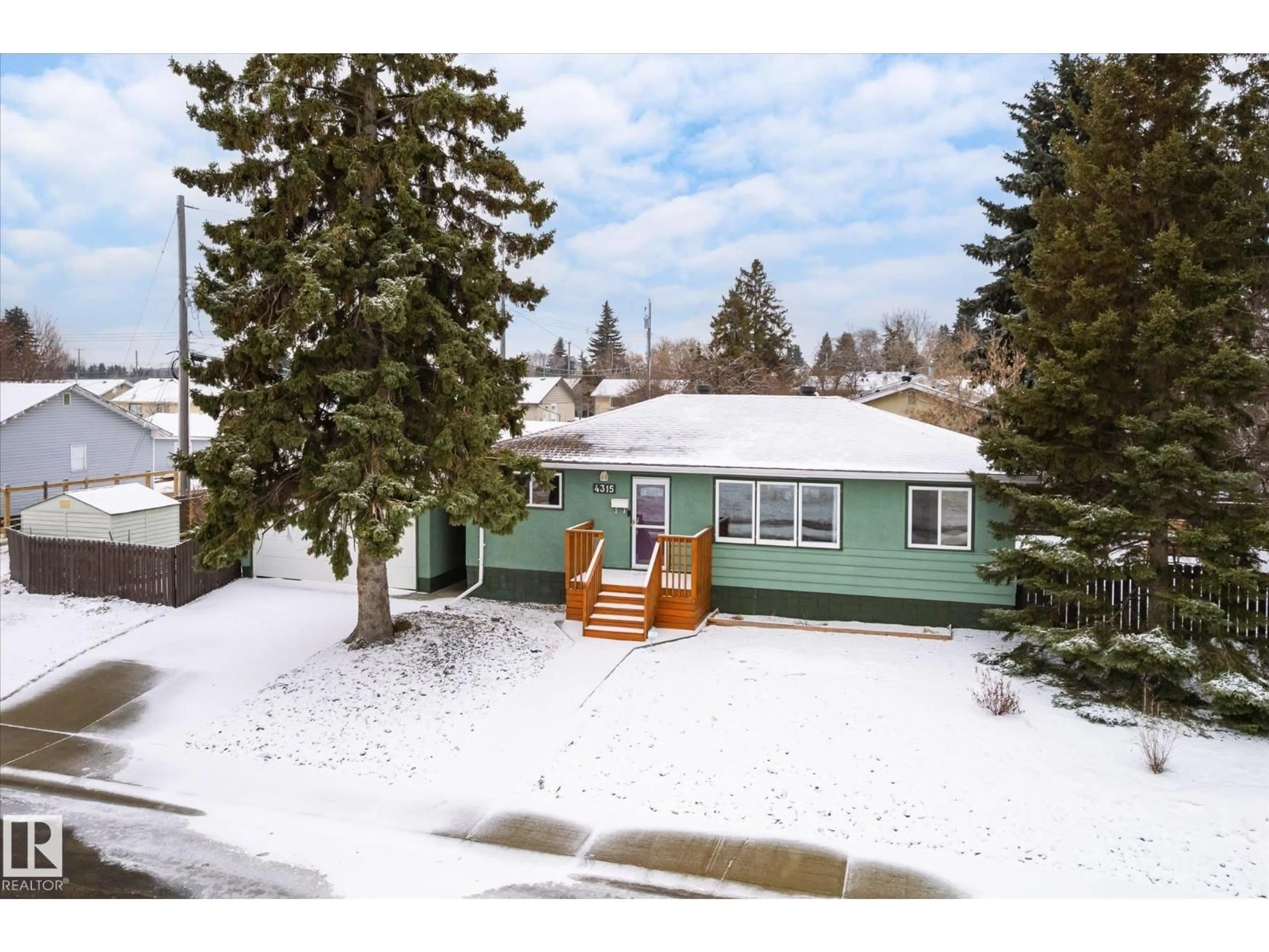 A pic from outside/outdoor area/front of a property/back of a property/a pic from drone, street for 4315 105A AV, Edmonton Alberta T6A1B7