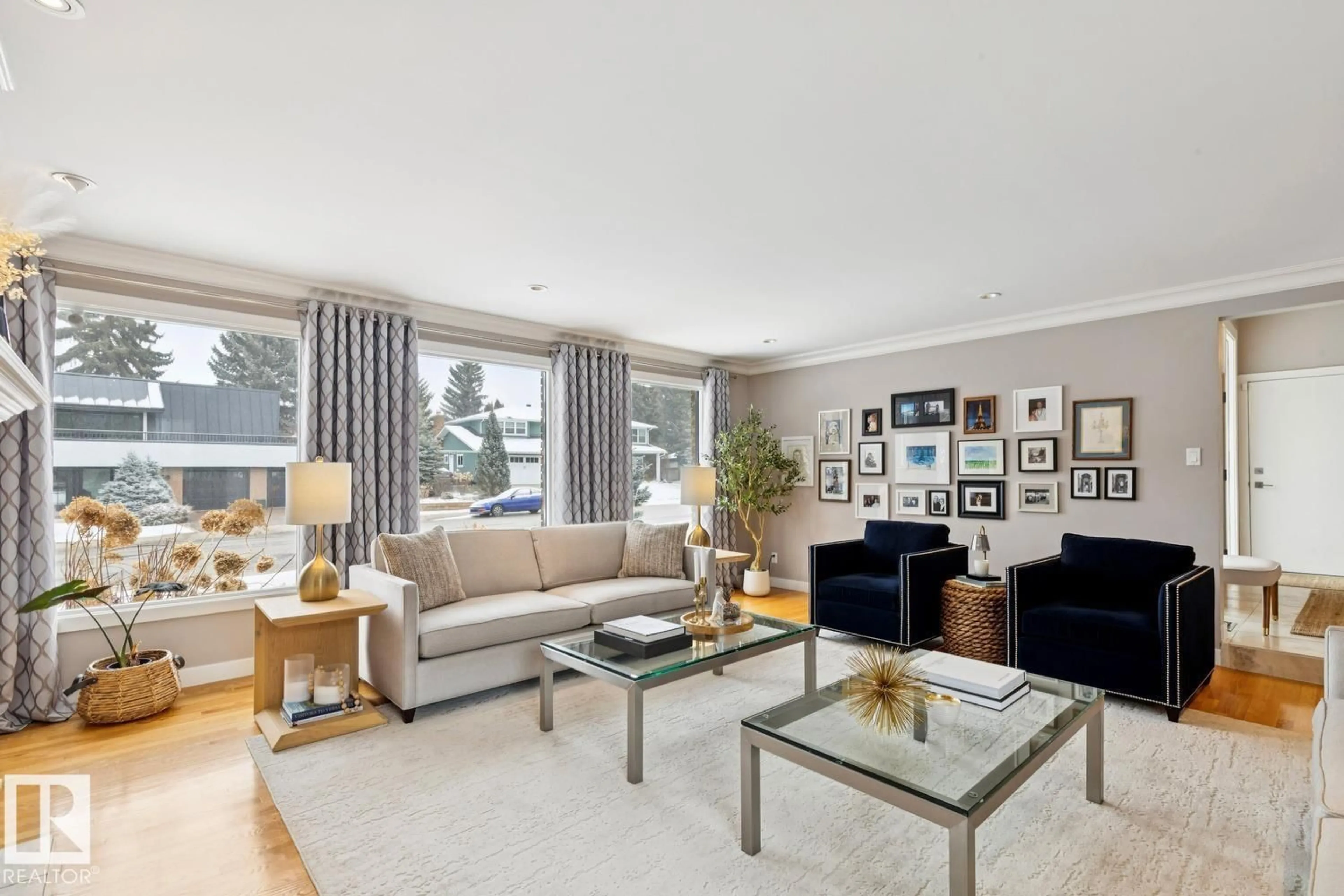 Living room with furniture, wood/laminate floor for 66 MARLBORO RD, Edmonton Alberta T6J2C2