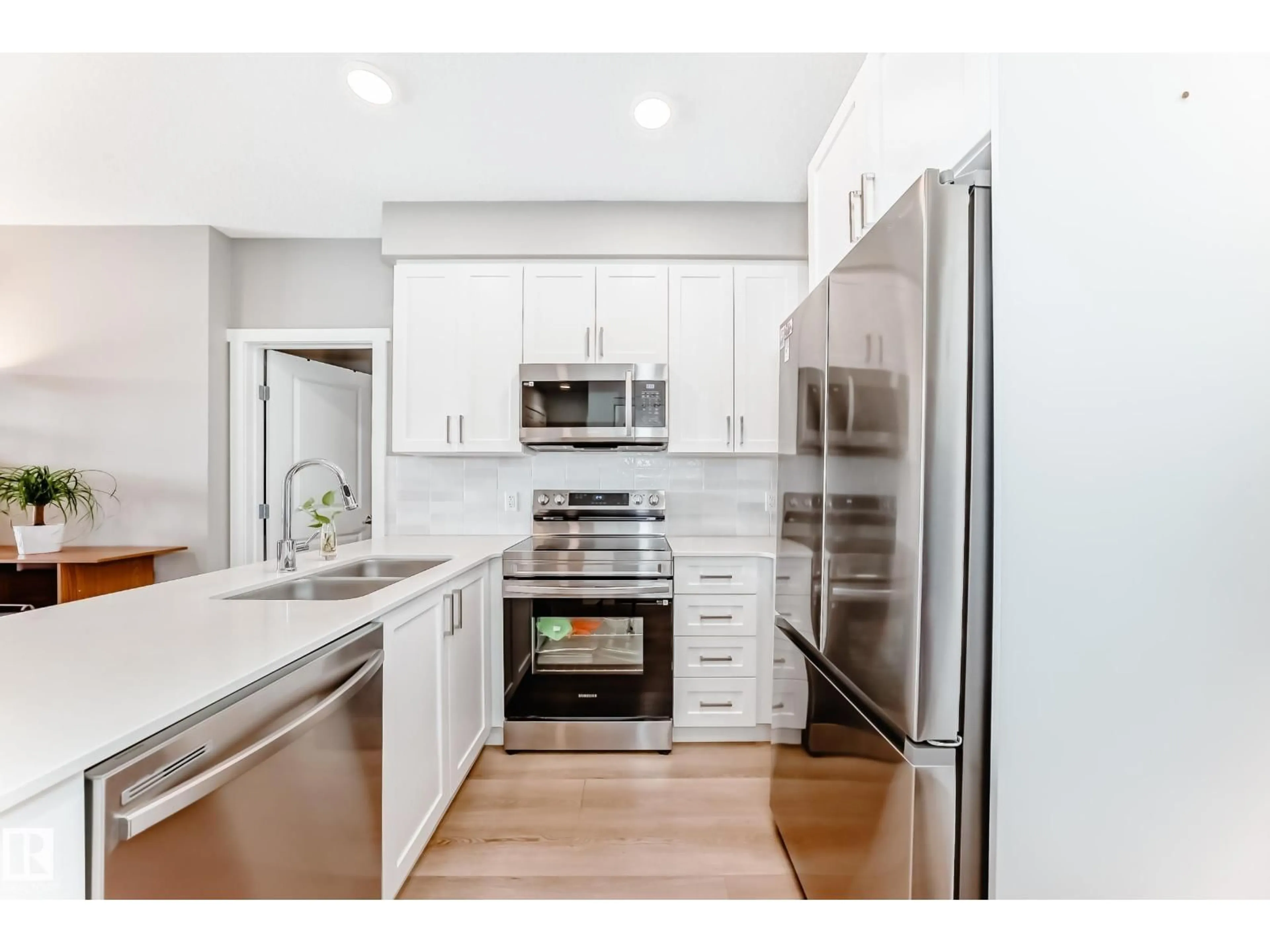 Open concept kitchen, unknown for 221 12804 140 AV, Edmonton Alberta T6V0M3