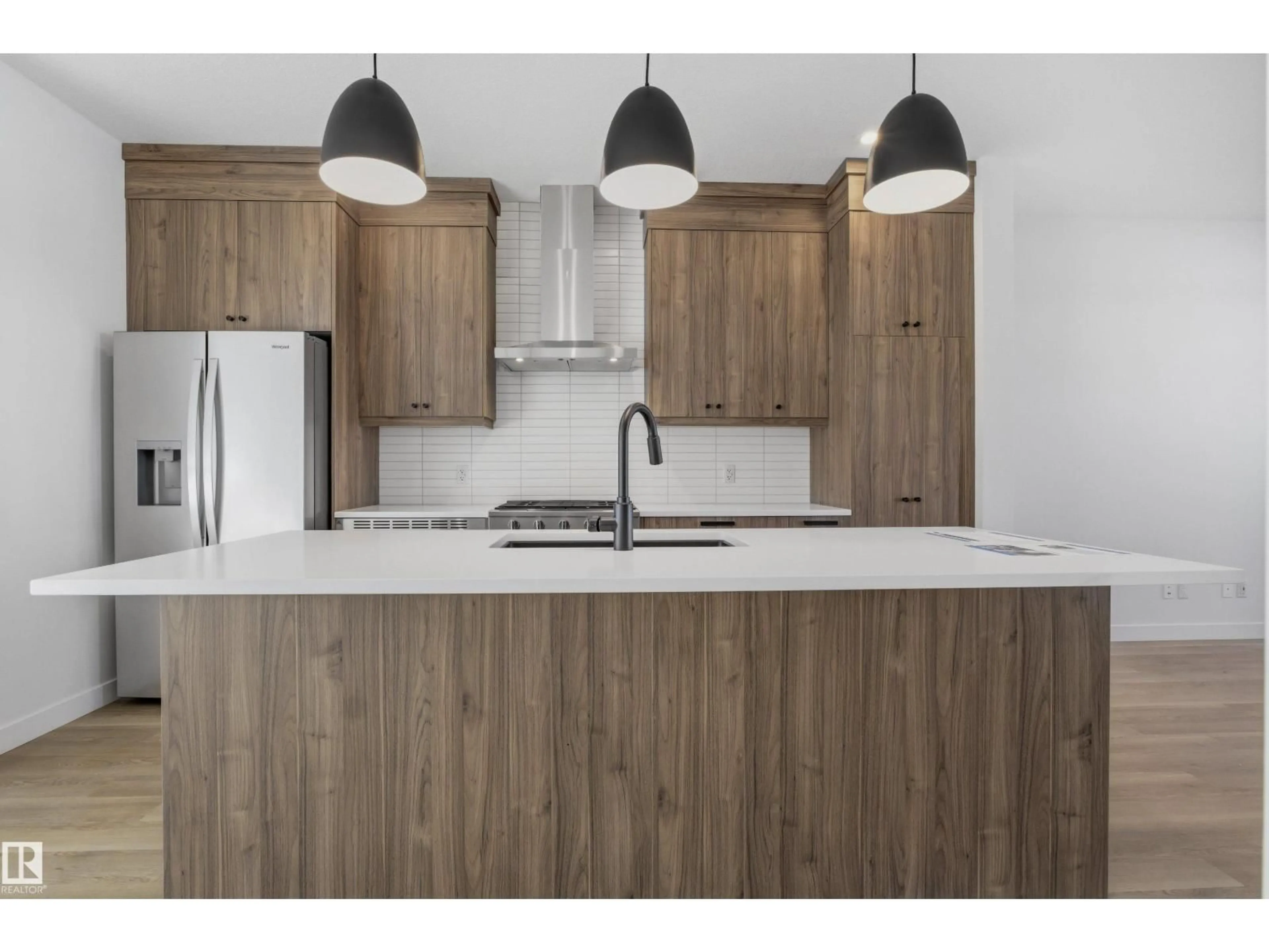 Open concept kitchen, wood/laminate floor for SW - 1227 CRISTALL WY, Edmonton Alberta T6W5T1