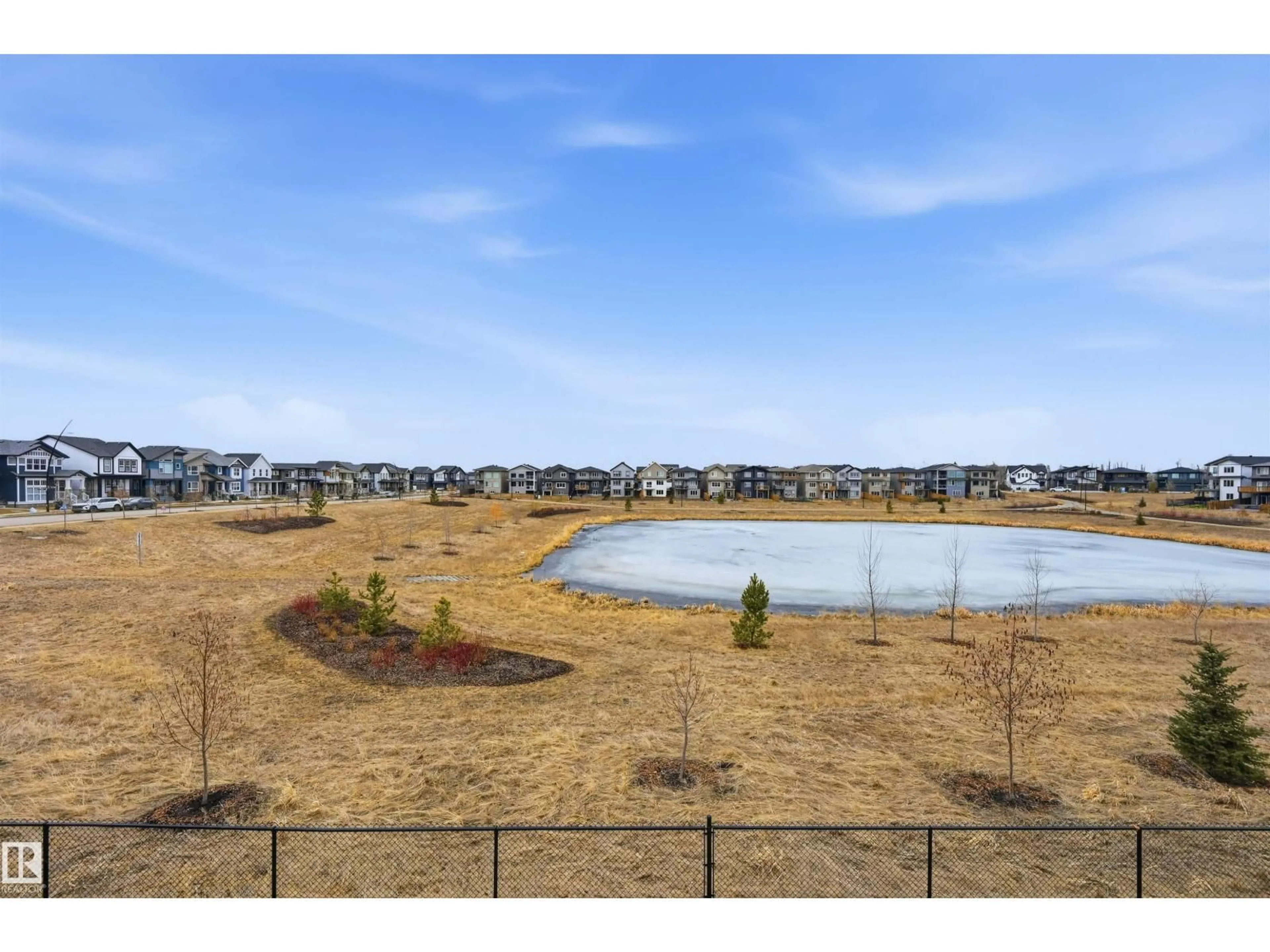 A pic from outside/outdoor area/front of a property/back of a property/a pic from drone, water/lake/river/ocean view for NW - 2520 206 ST, Edmonton Alberta T6M1P1