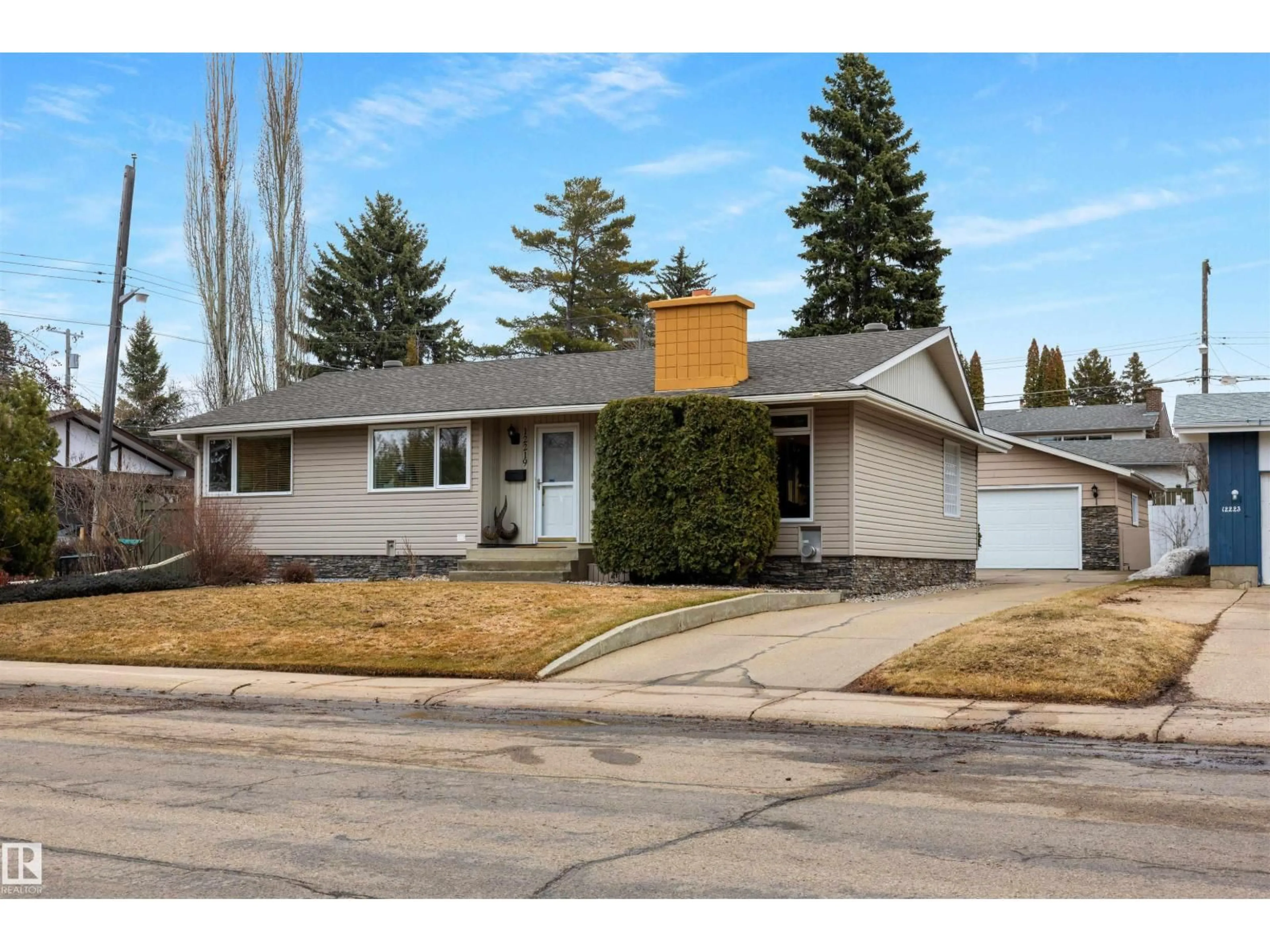 Home with vinyl exterior material, street for 12219 42A AV, Edmonton Alberta T6J0X5