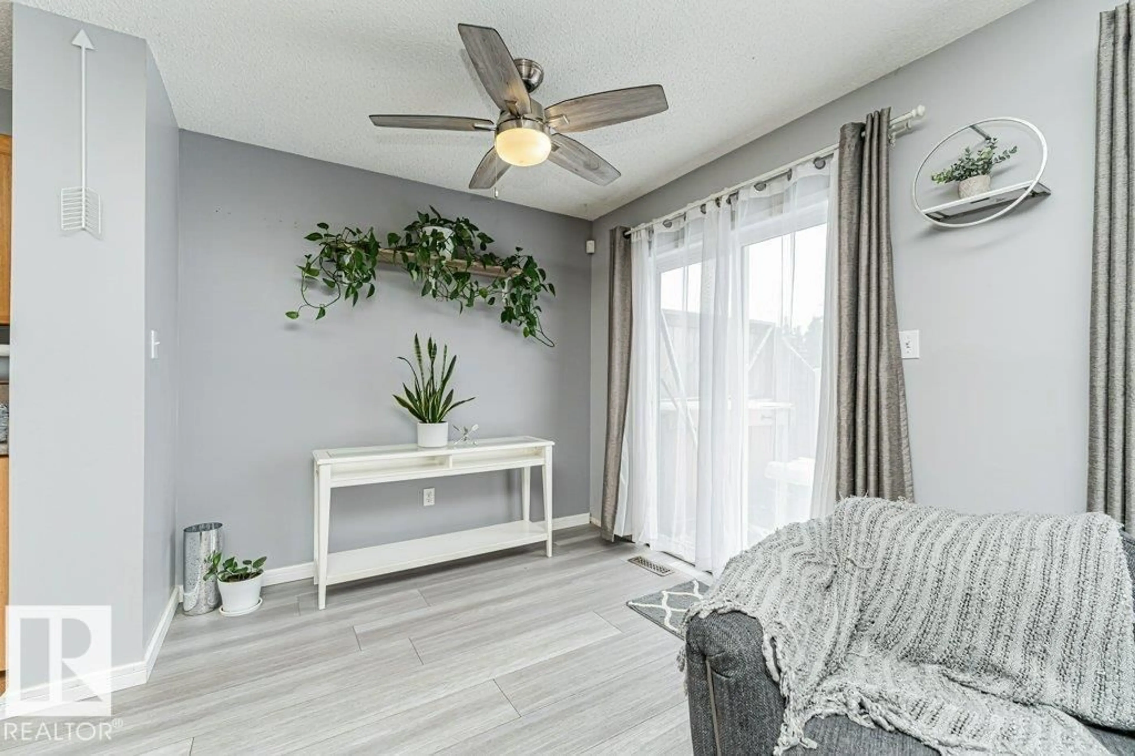 Living room with furniture, unknown for 9136 166 AV, Edmonton Alberta T5Z3H4