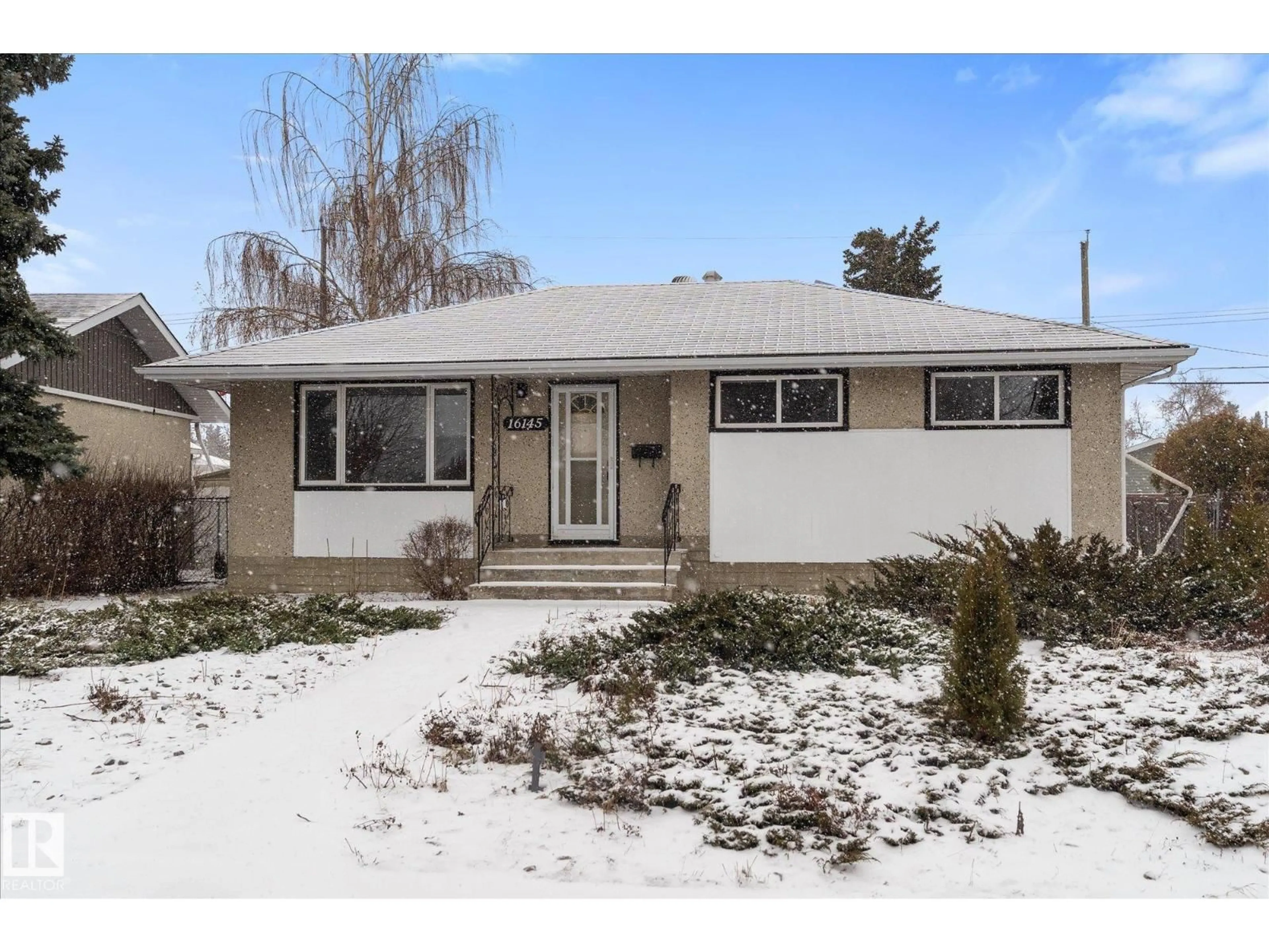Home with vinyl exterior material, street for 16145 109A AV, Edmonton Alberta T5P1C5