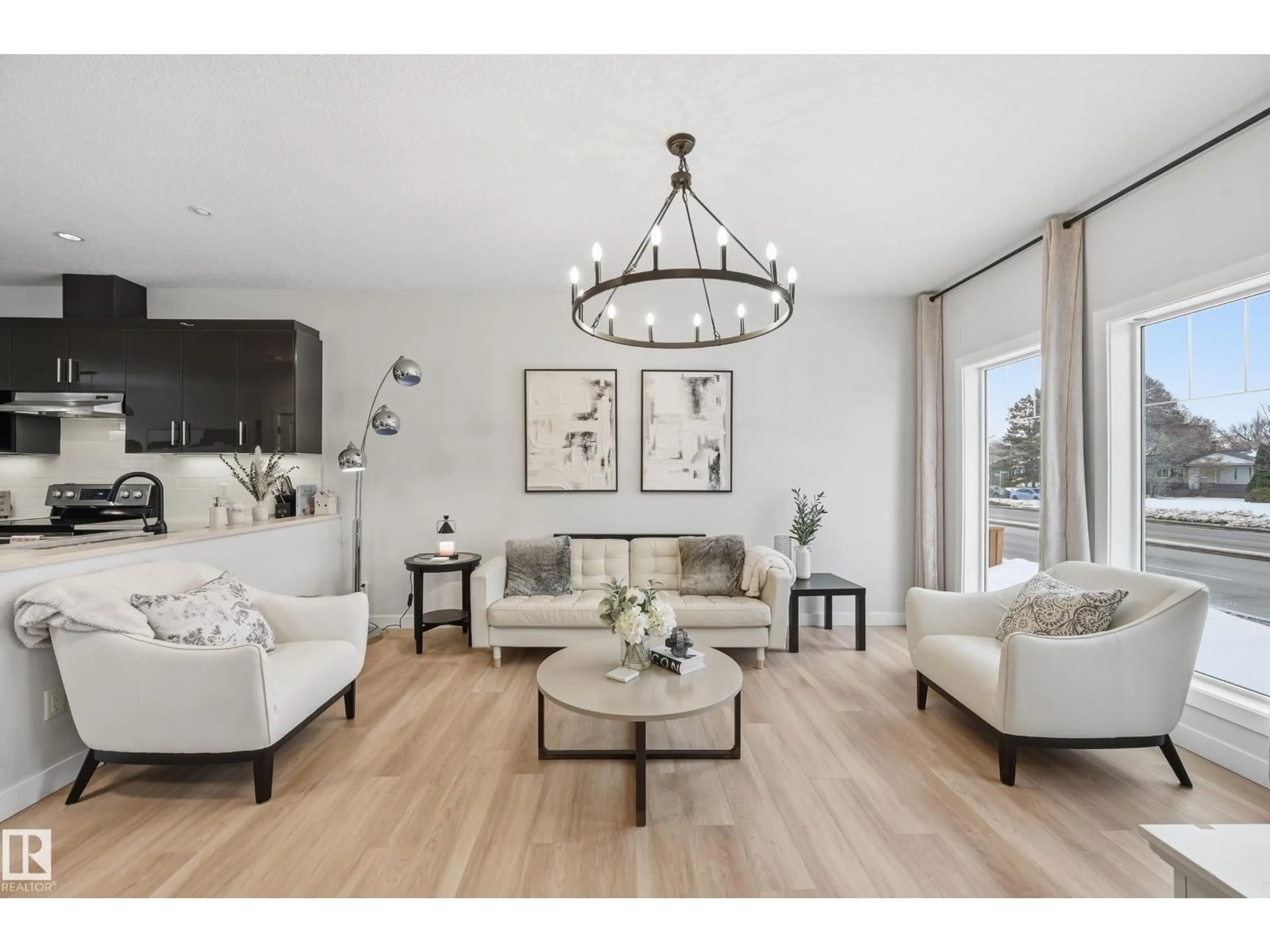 Living room with furniture, wood/laminate floor for NW - 10736 149 ST, Edmonton Alberta T5P1M2