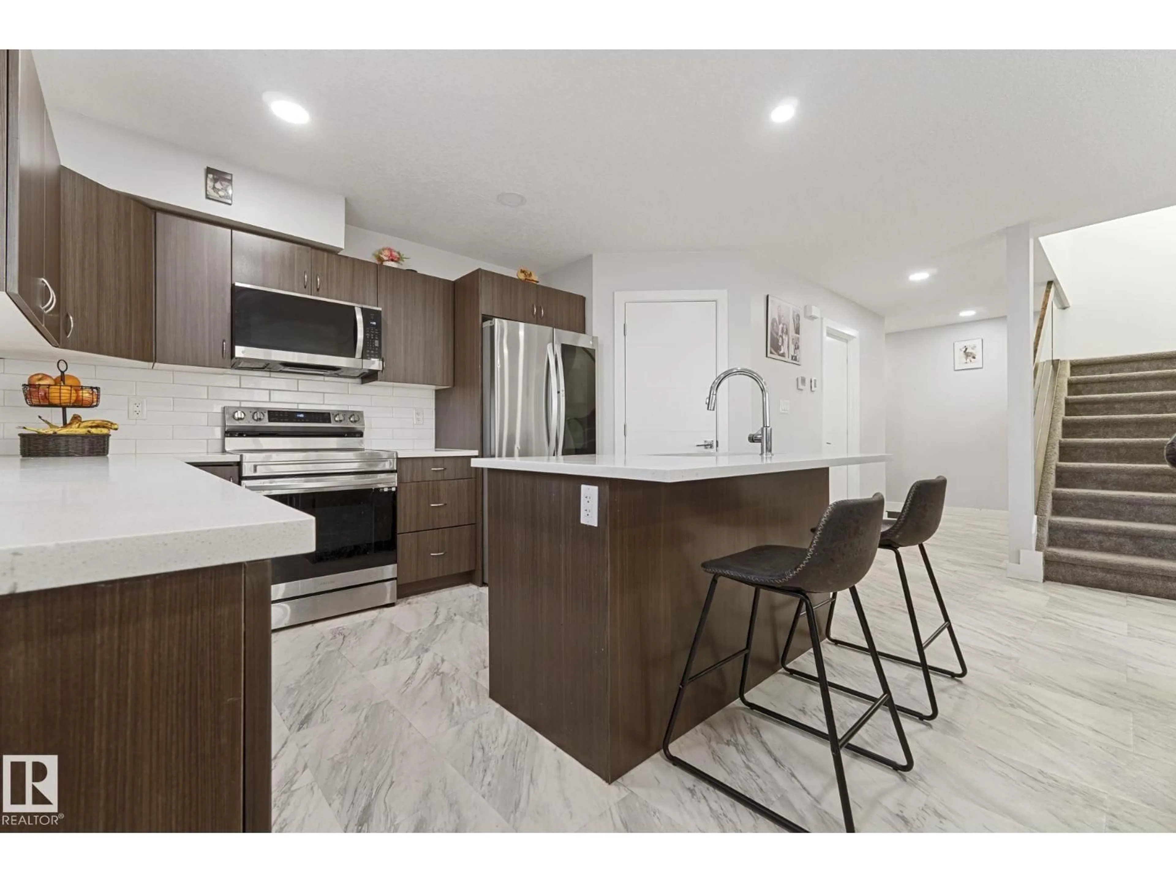 Open concept kitchen, ceramic/tile floor for 8955 150 ST, Edmonton Alberta T5R1E6