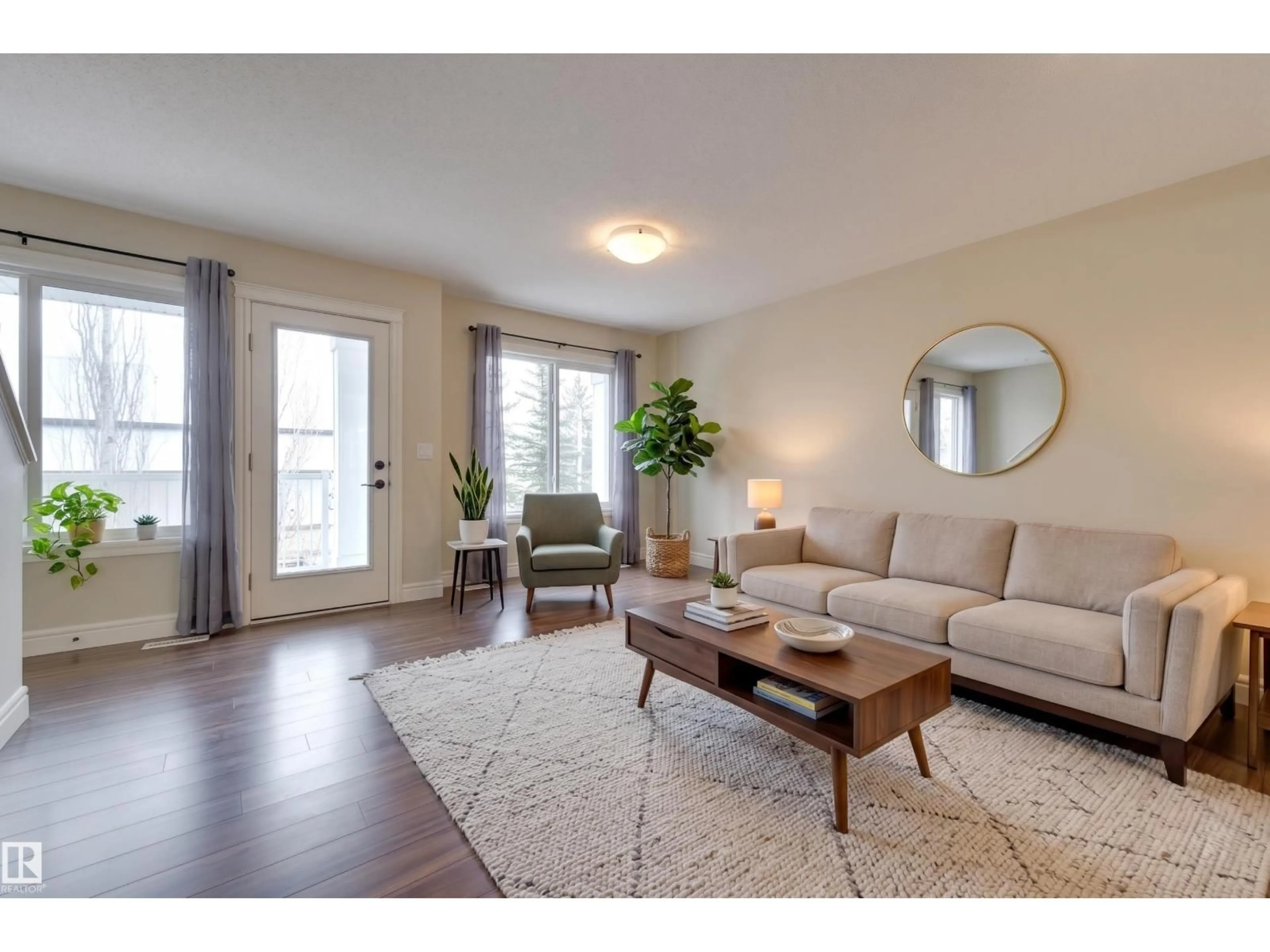 Living room with furniture, wood/laminate floor for 330 - 57 BULYEA RD, Edmonton Alberta T6R0W8