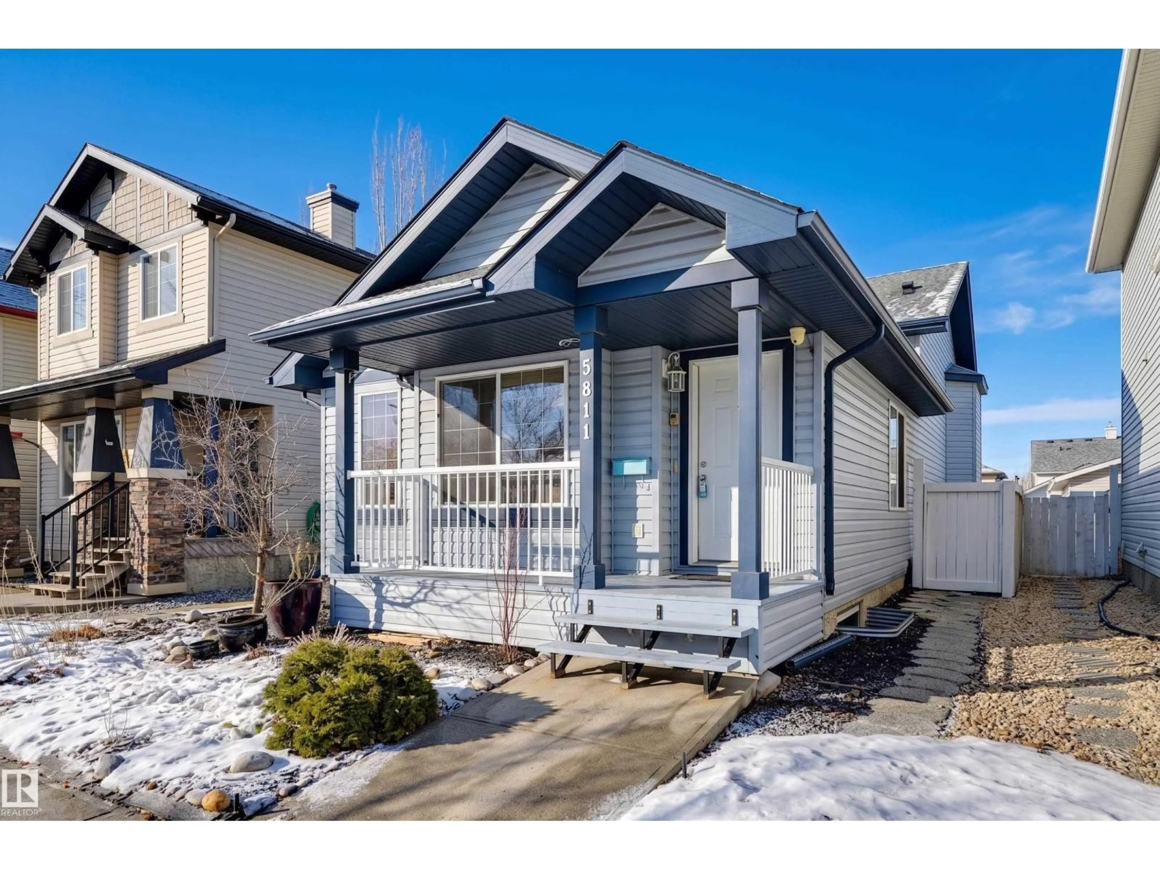 Home with vinyl exterior material, street for 5811 SUTTER PL, Edmonton Alberta T6R3R3
