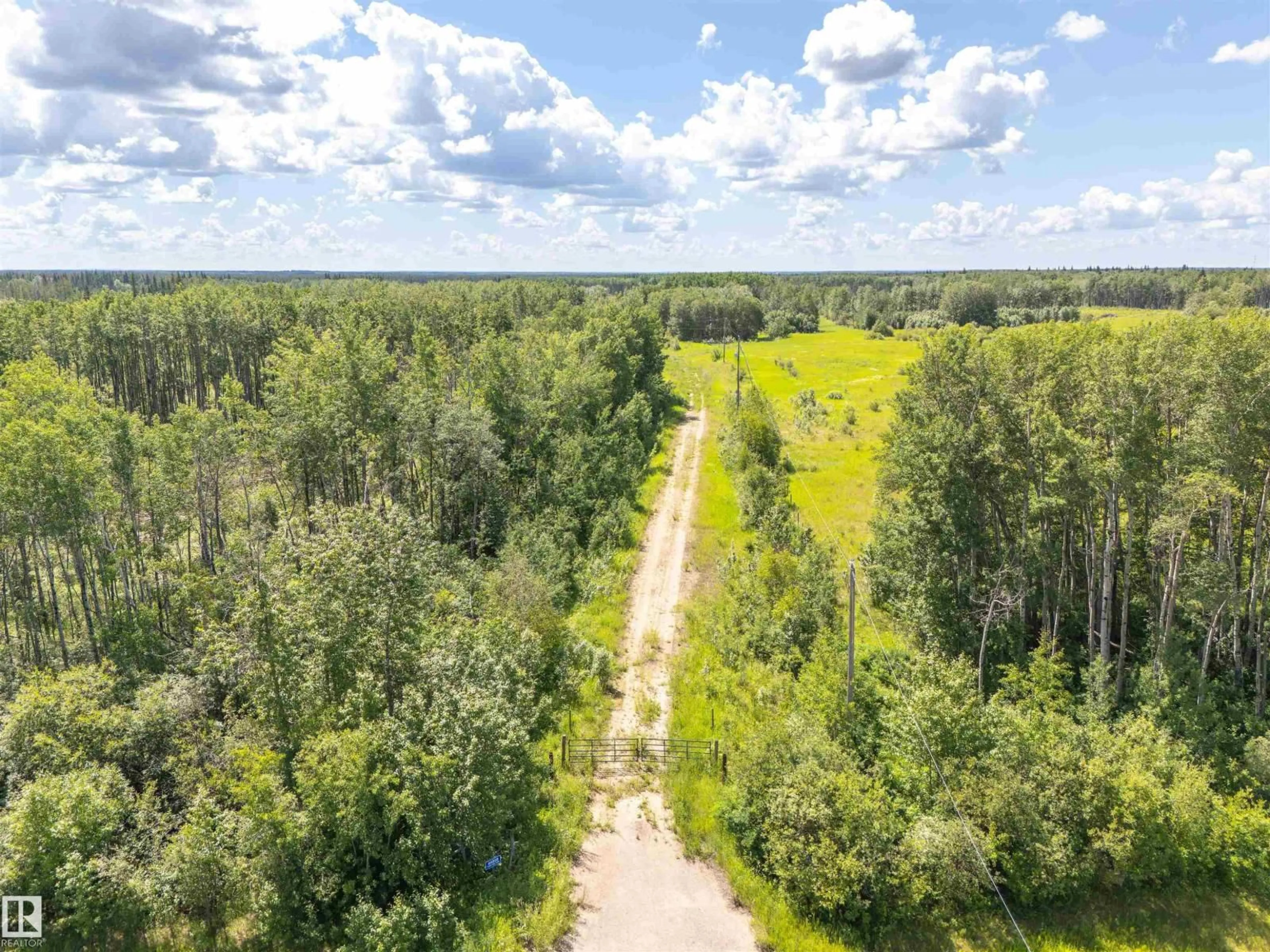 A pic from outside/outdoor area/front of a property/back of a property/a pic from drone, forest/trees view for 44009 TWP RD 640, Rural Bonnyville M.D. Alberta T9M1P2