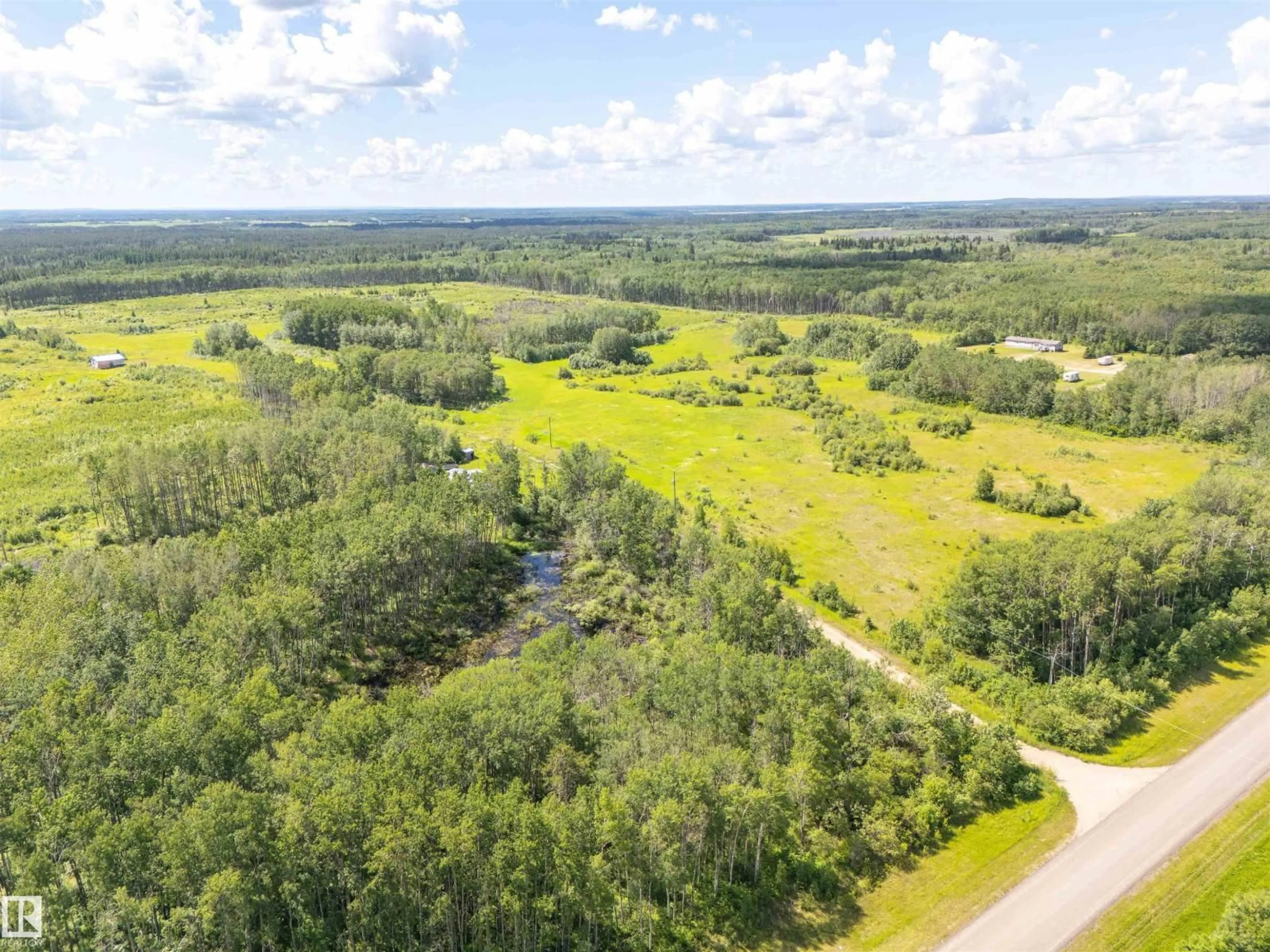 A pic from outside/outdoor area/front of a property/back of a property/a pic from drone, forest/trees view for 44009 TWP RD 640, Rural Bonnyville M.D. Alberta T9M1P2