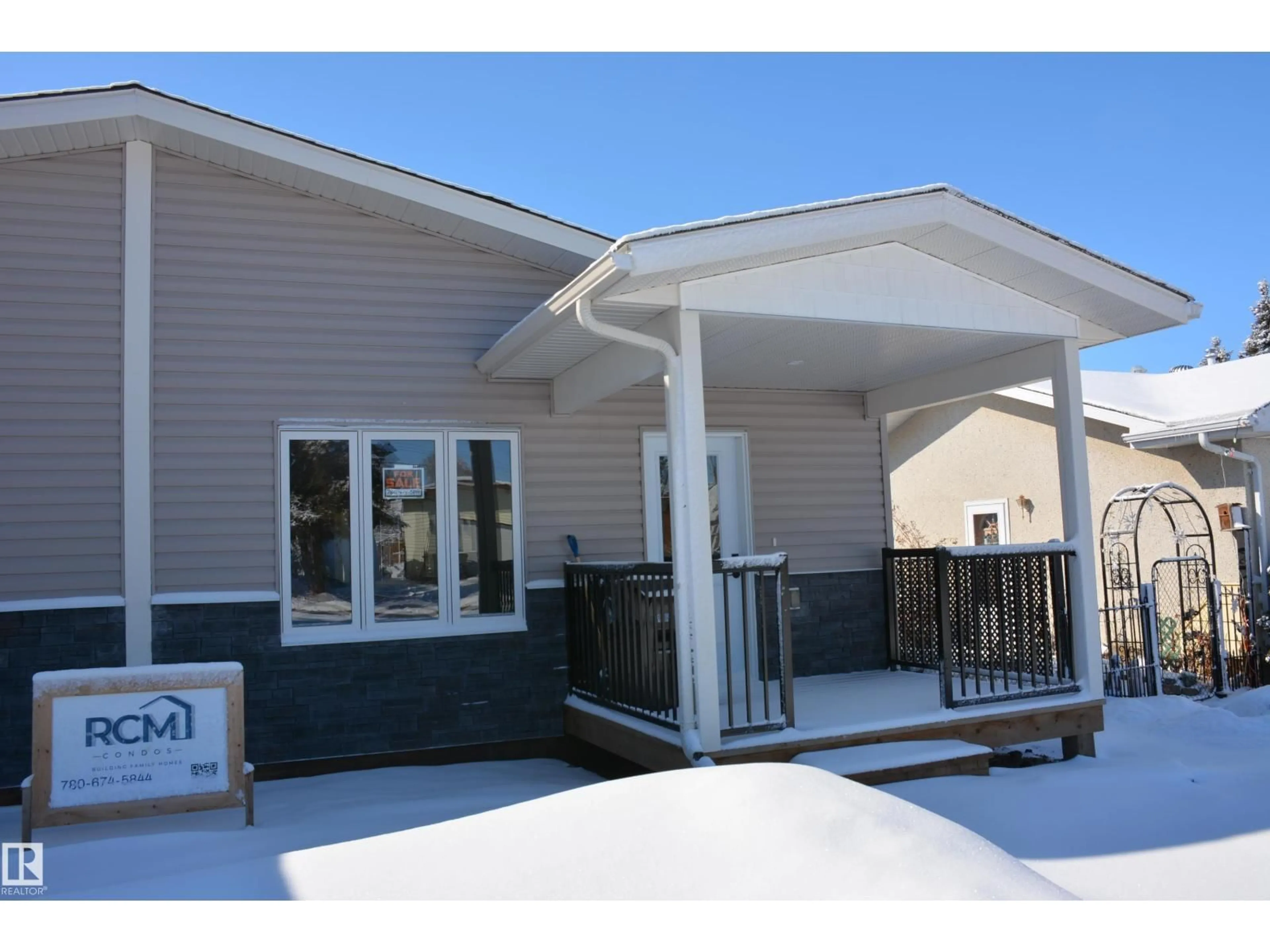 Home with vinyl exterior material, street for B - 4313 54 AV, Barrhead Alberta T7N1J8