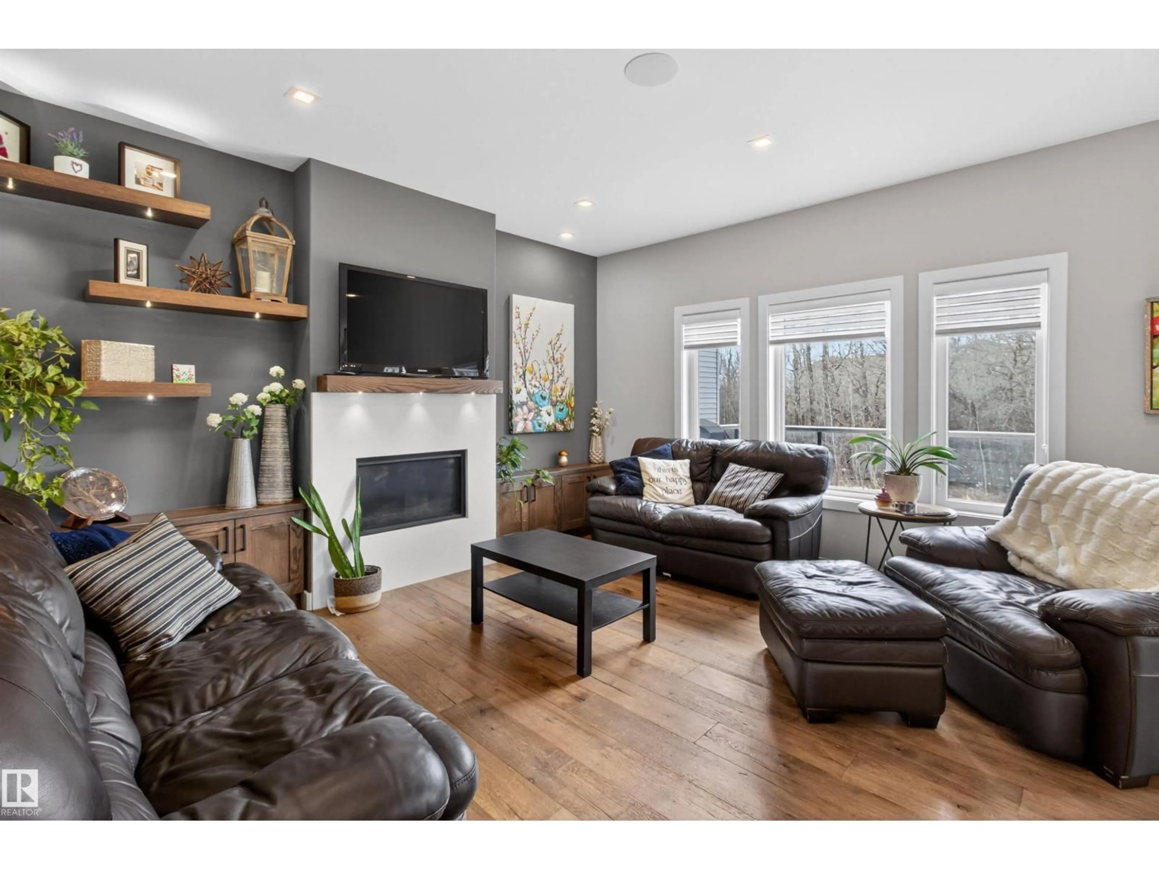 Living room with furniture, wood/laminate floor for 17616 78 ST, Edmonton Alberta T5Z0N2