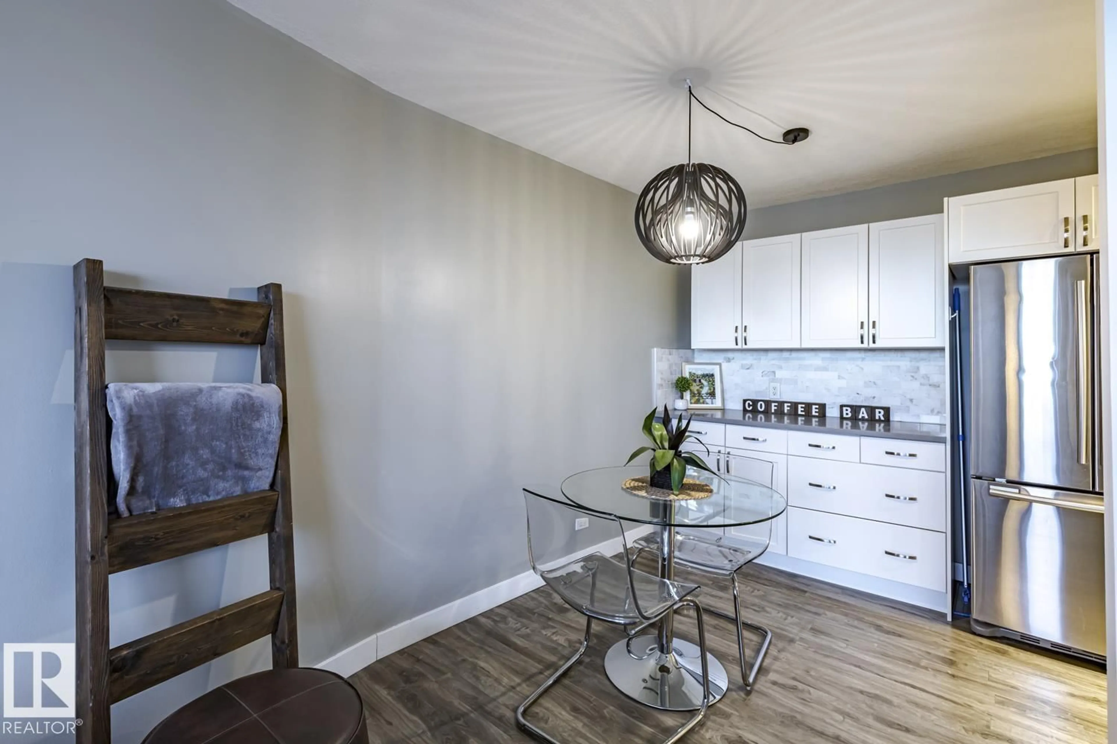 Open concept kitchen, wood/laminate floor for 105 - 10883 SASKATCHEWAN DRIVE NW, Edmonton Alberta T6E4S6