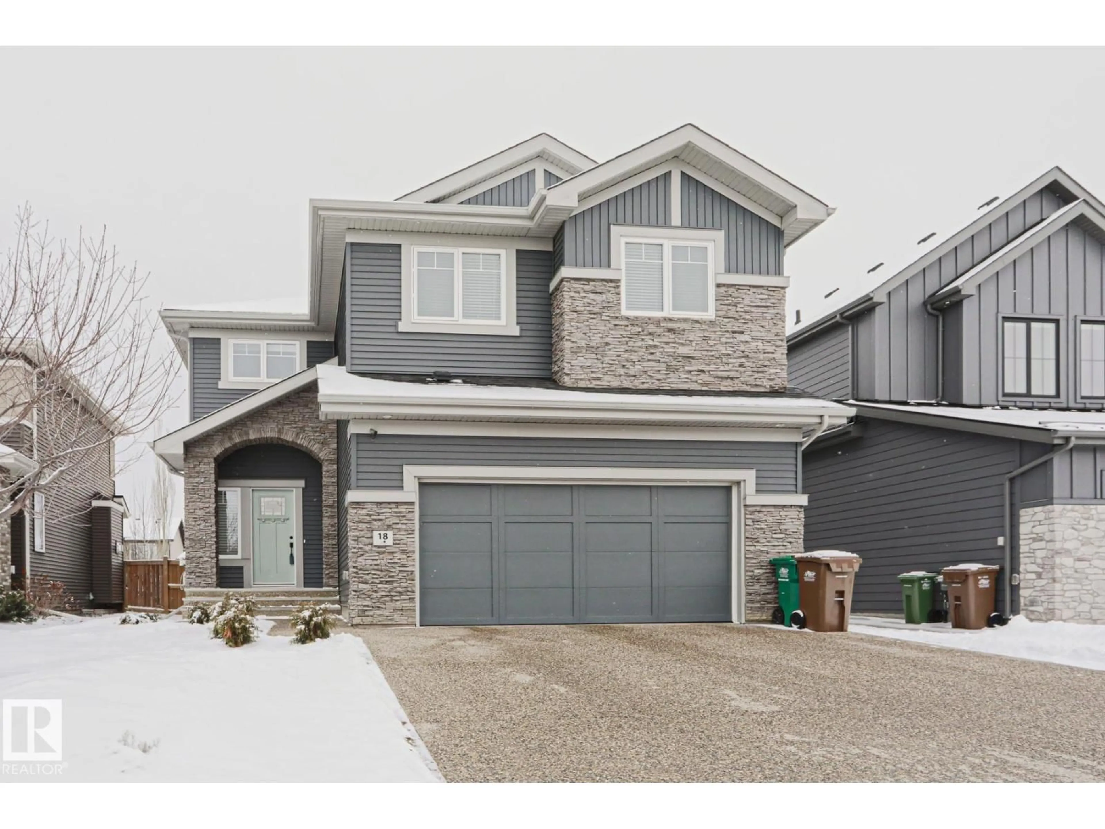 Home with vinyl exterior material, street for 18 ENCHANTED WAY, St. Albert Alberta T8N7R5