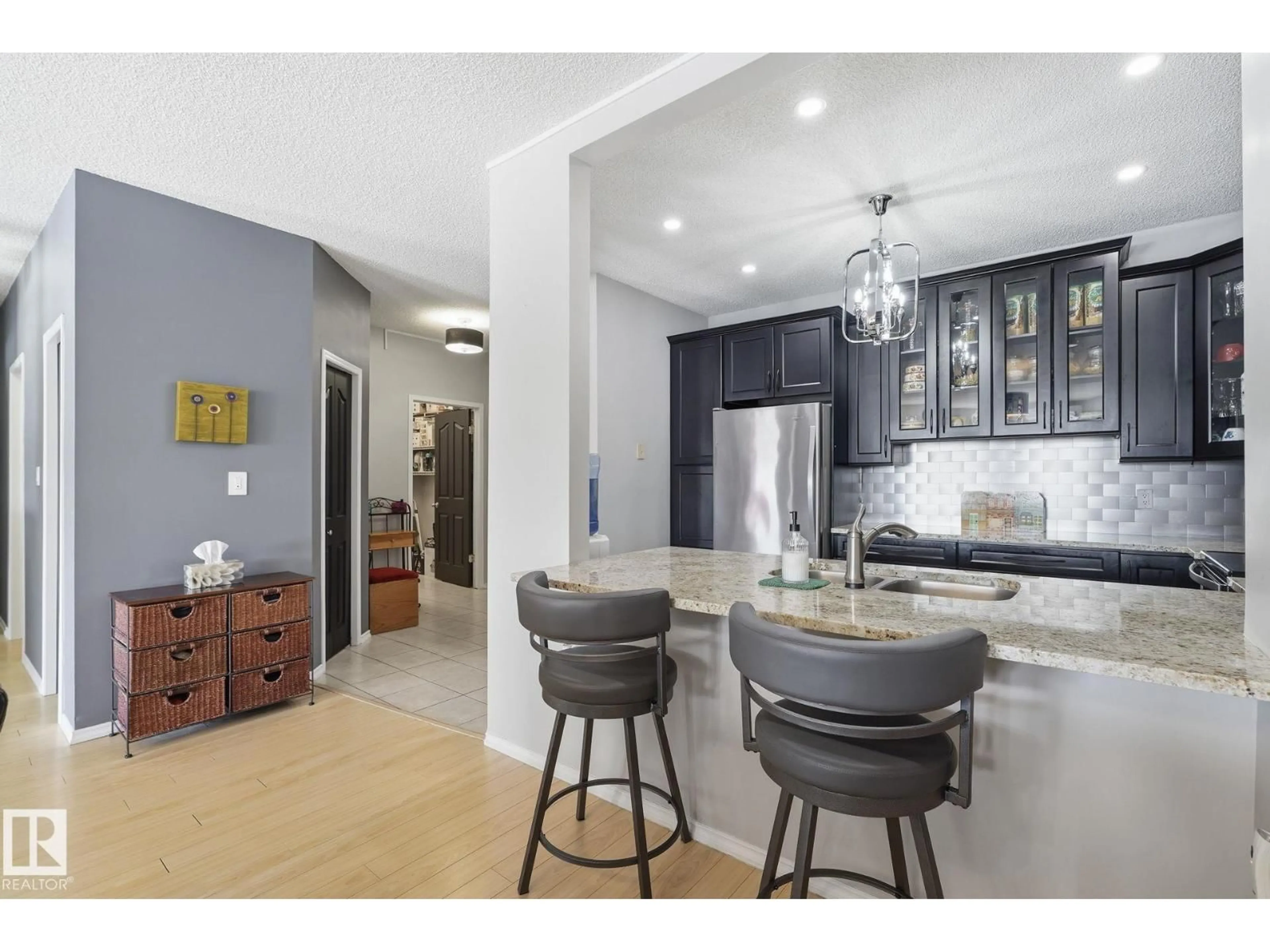 Open concept kitchen, ceramic/tile floor for #334 - 15499 CASTLE DOWNS RD, Edmonton Alberta T5X5Y3