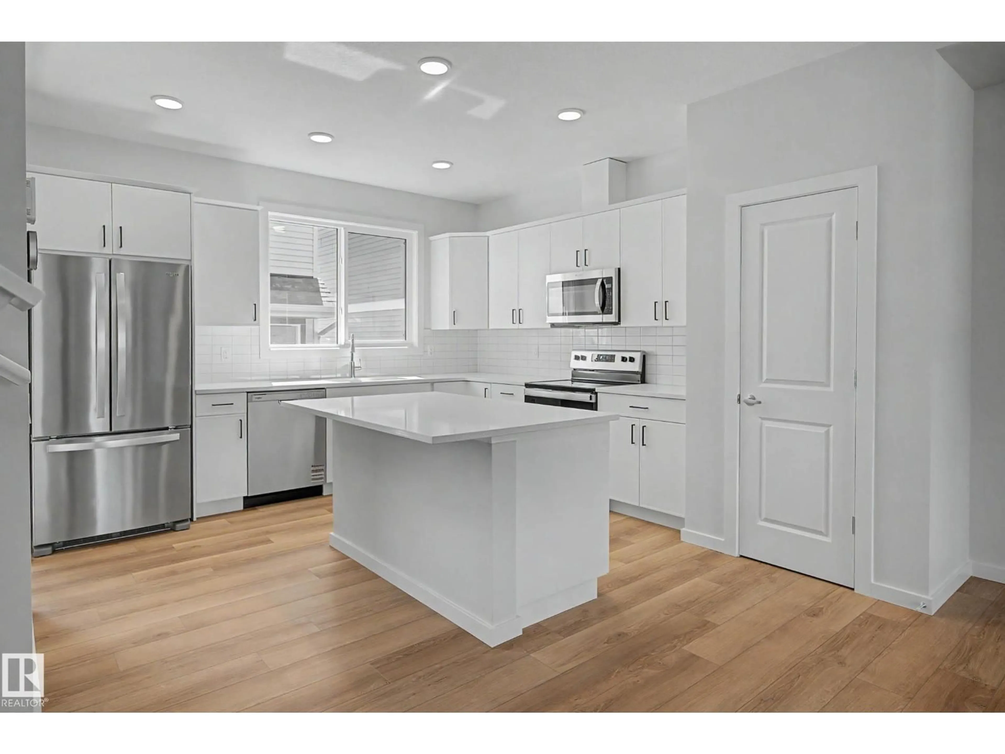 Open concept kitchen, unknown for NW - 21203 25 AV, Edmonton Alberta T6M3H3