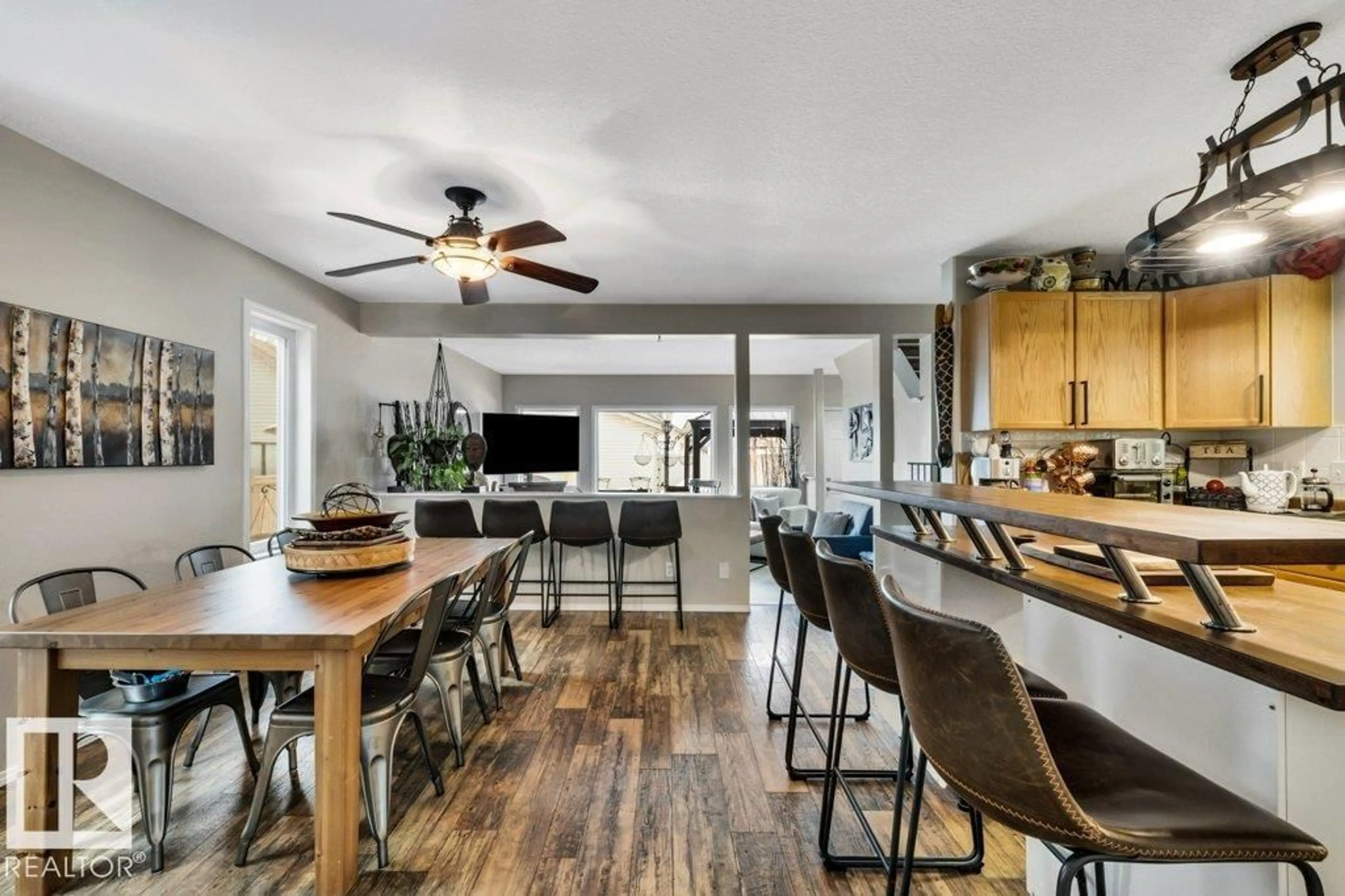 Open concept kitchen, wood/laminate floor for 1314 GEORGE CL, Edmonton Alberta T5T6S2