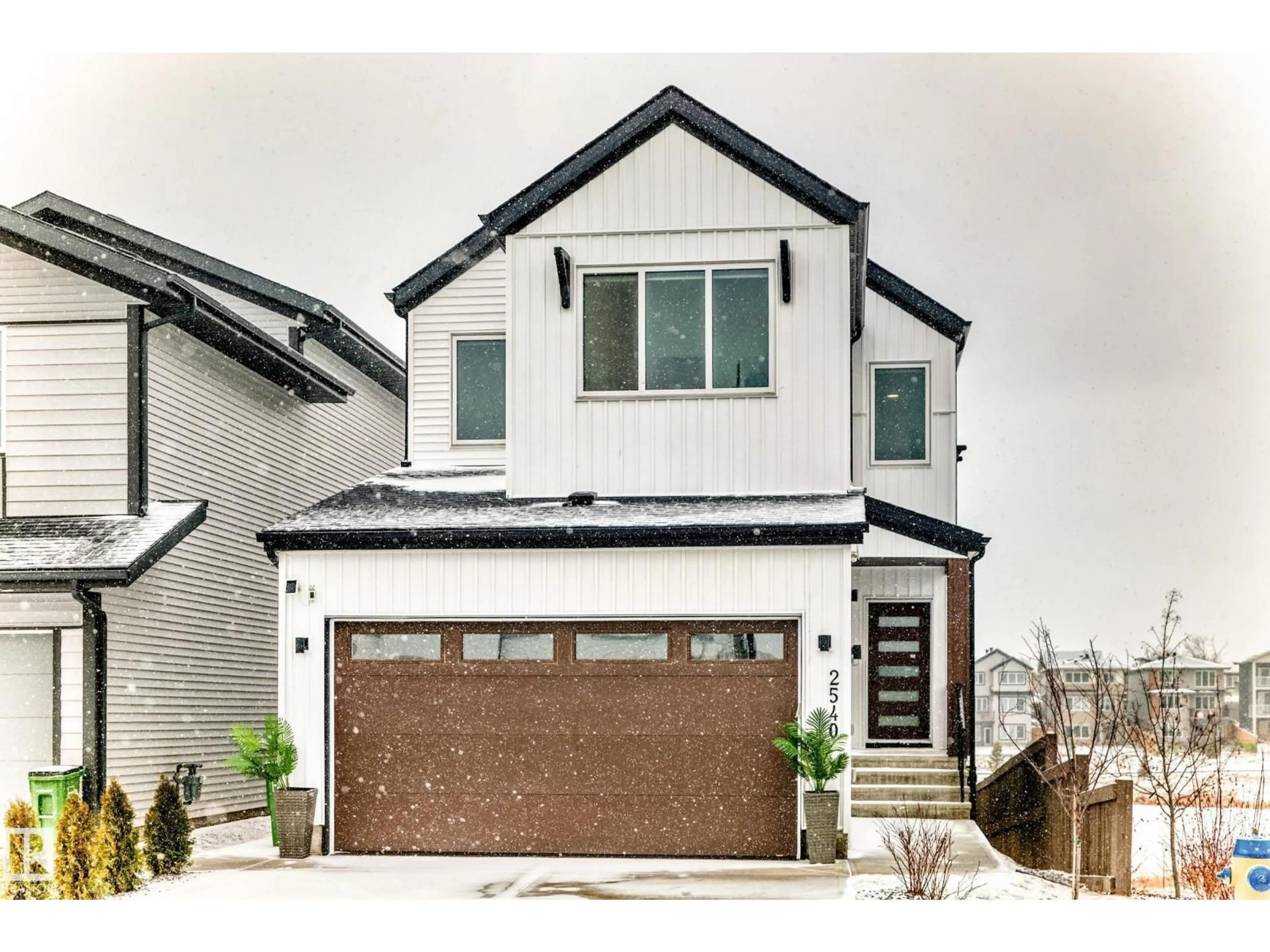 Home with brick exterior material, street for NW - 2540 206 ST, Edmonton Alberta T6M1P1