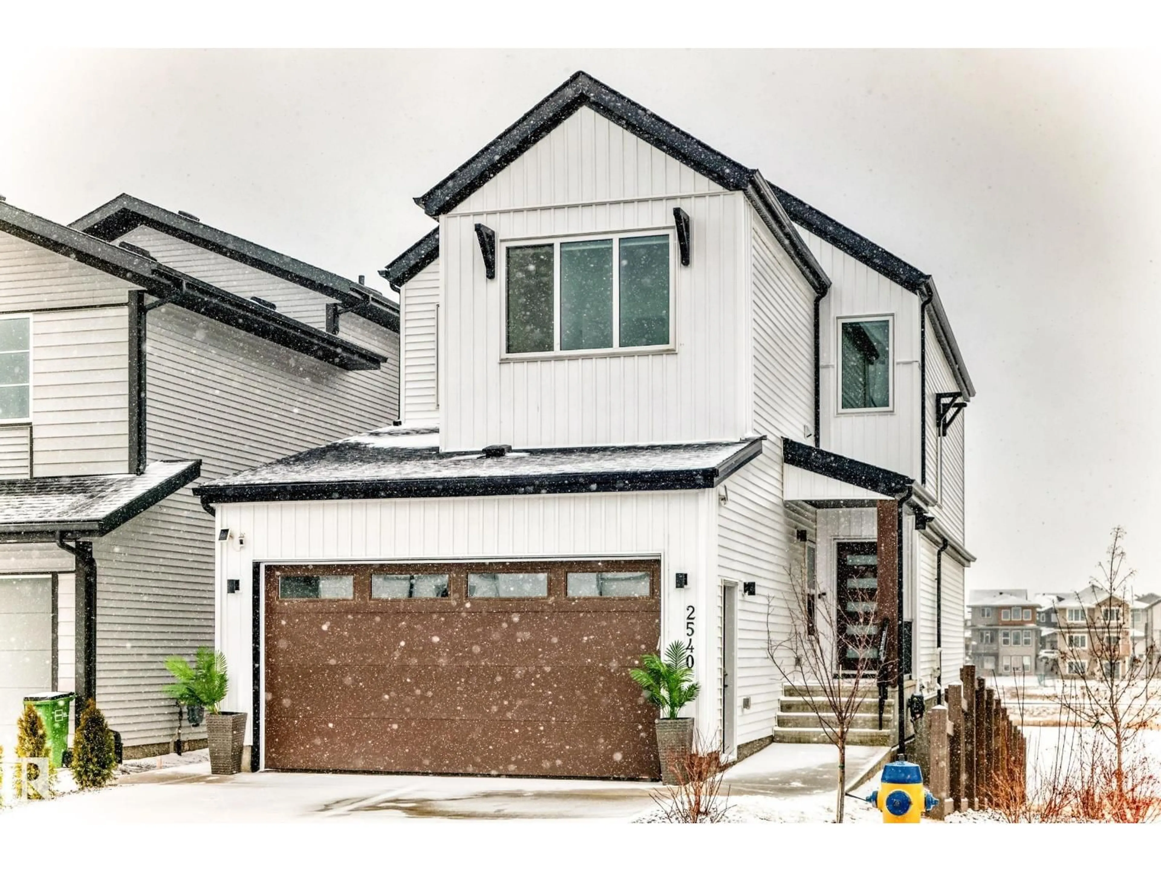 Home with brick exterior material, street for NW - 2540 206 ST, Edmonton Alberta T6M1P1