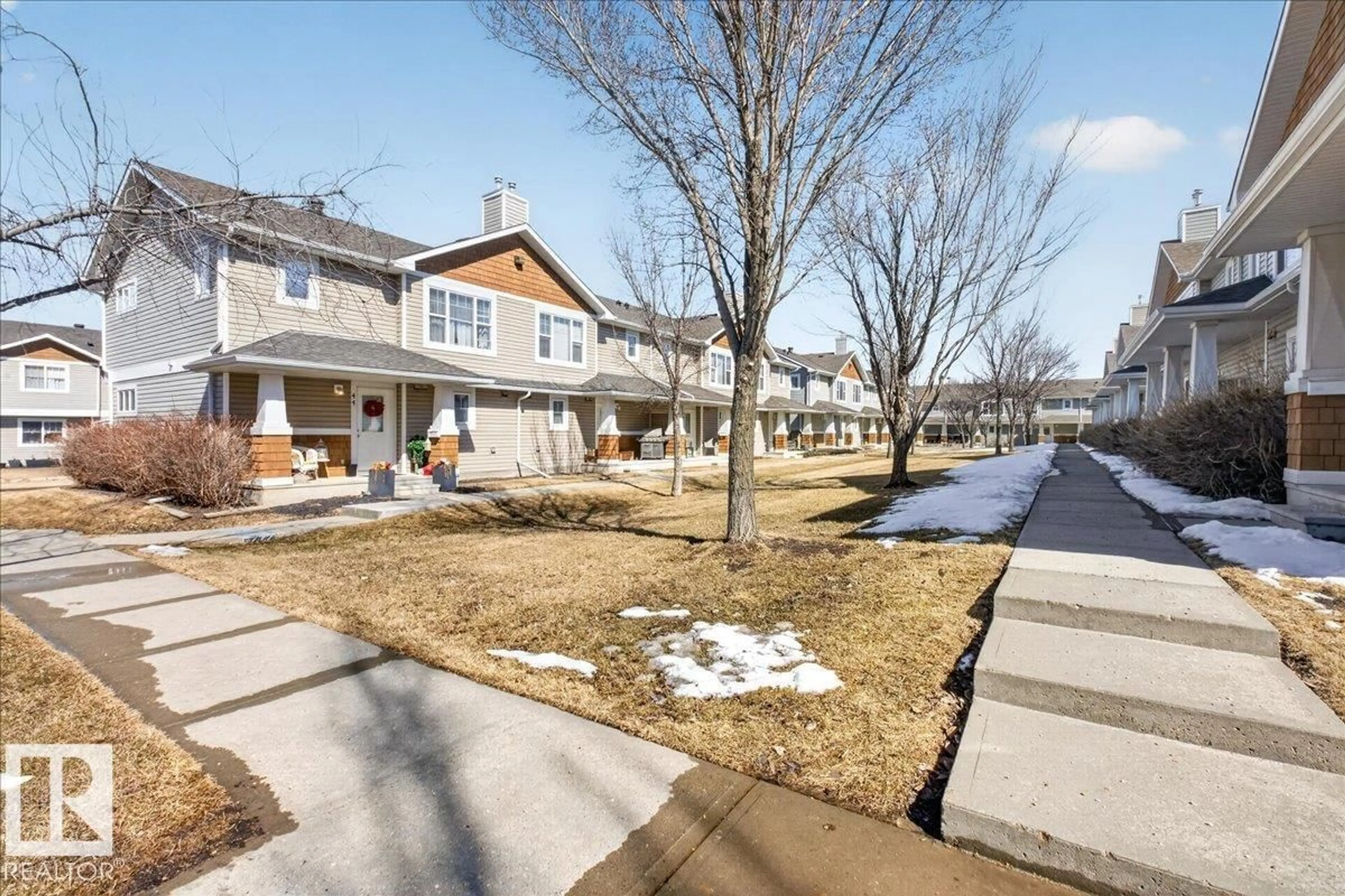 A pic from outside/outdoor area/front of a property/back of a property/a pic from drone, street for 70 - 67 CAVAN RD, Sherwood Park Alberta T8H2W9