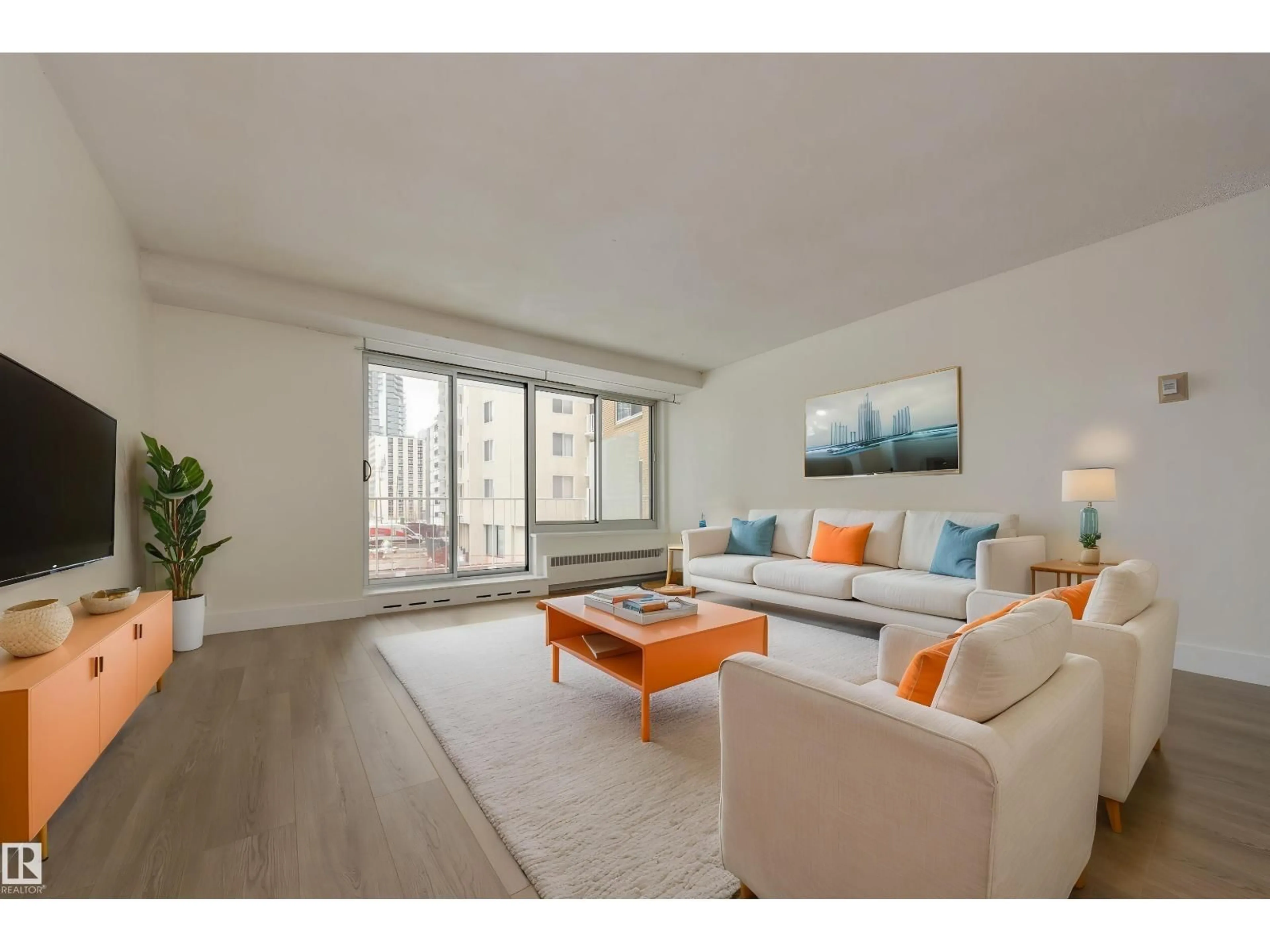 Living room with furniture, unknown for #207 - 12207 JASPER AV, Edmonton Alberta T5N3K2