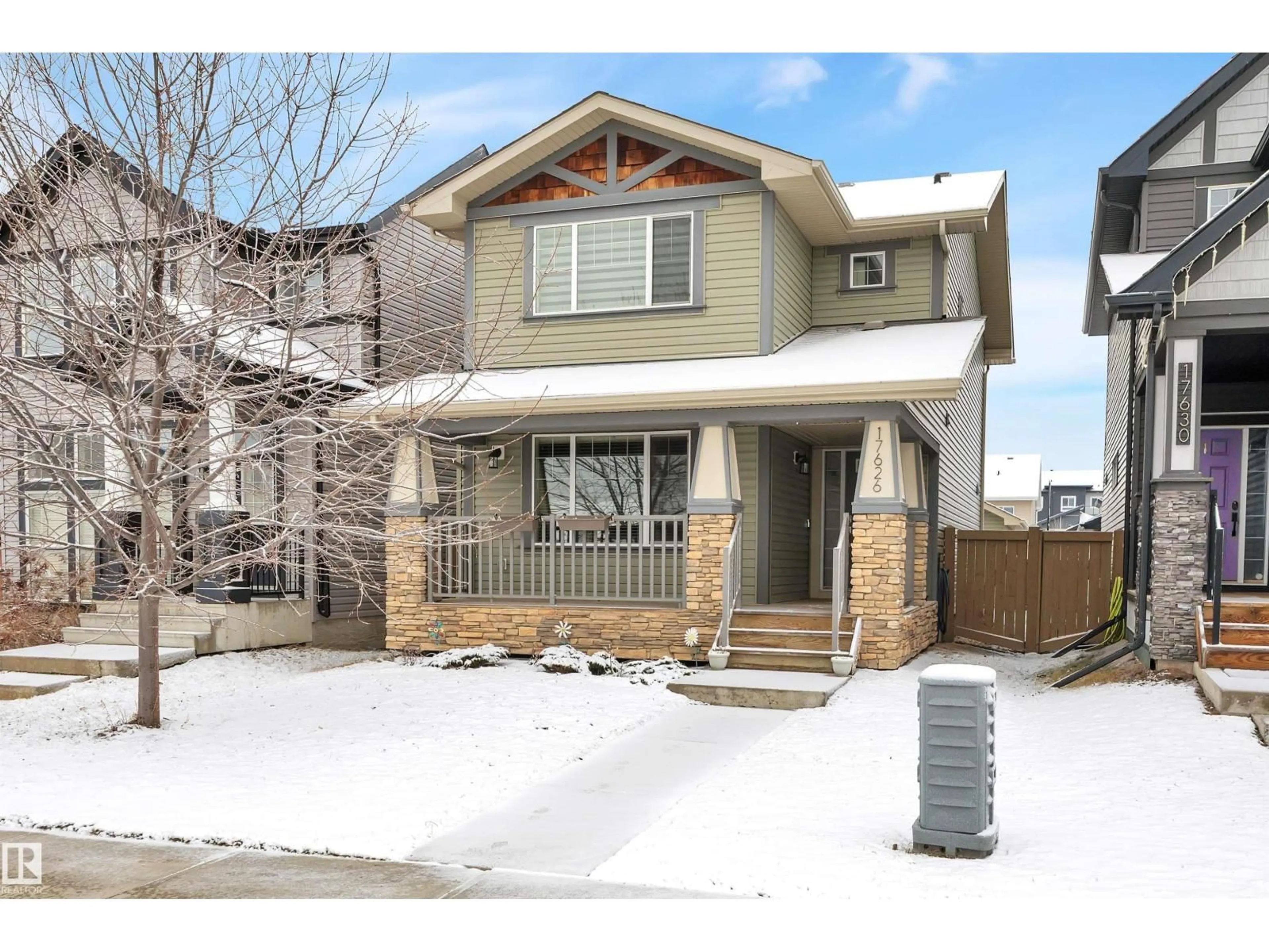 Home with vinyl exterior material, street for 17626 61A ST NW, Edmonton Alberta T5Y3N9
