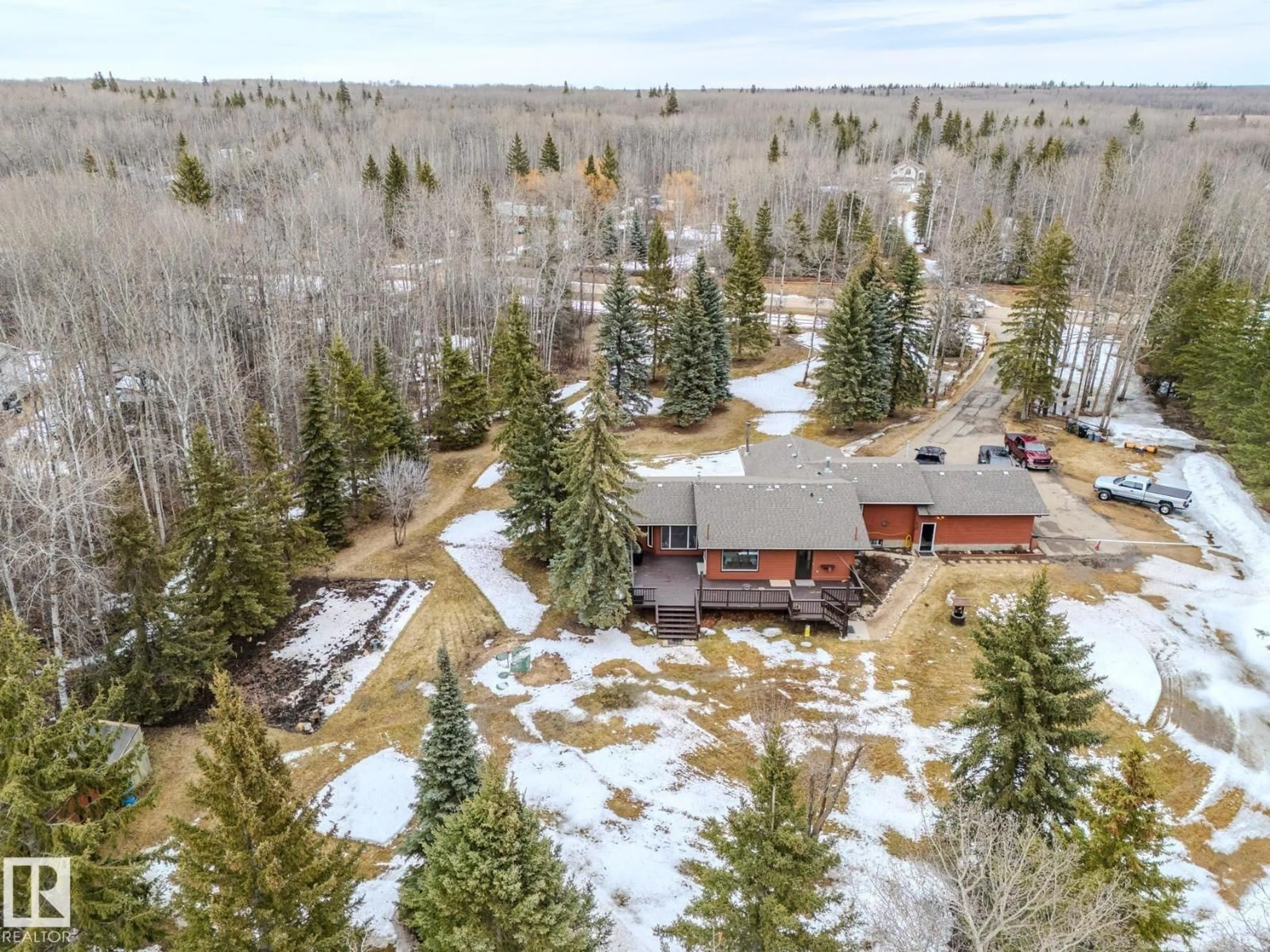 A pic from outside/outdoor area/front of a property/back of a property/a pic from drone, forest/trees view for 146 - 52009 RGE ROAD 214, Rural Strathcona County Alberta T8A1A2