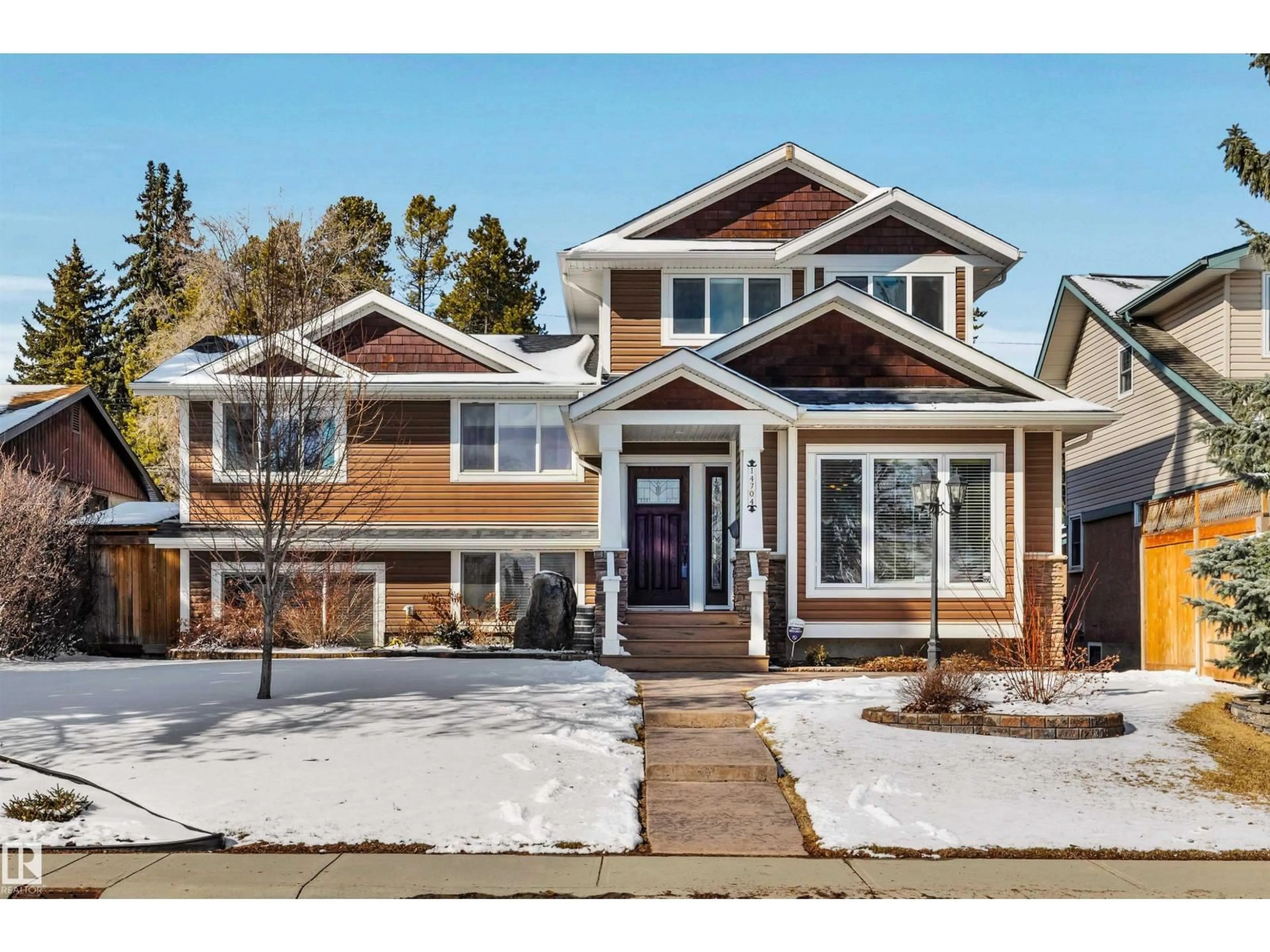 Home with vinyl exterior material, street for 14704 88 AV, Edmonton Alberta T5R4J8