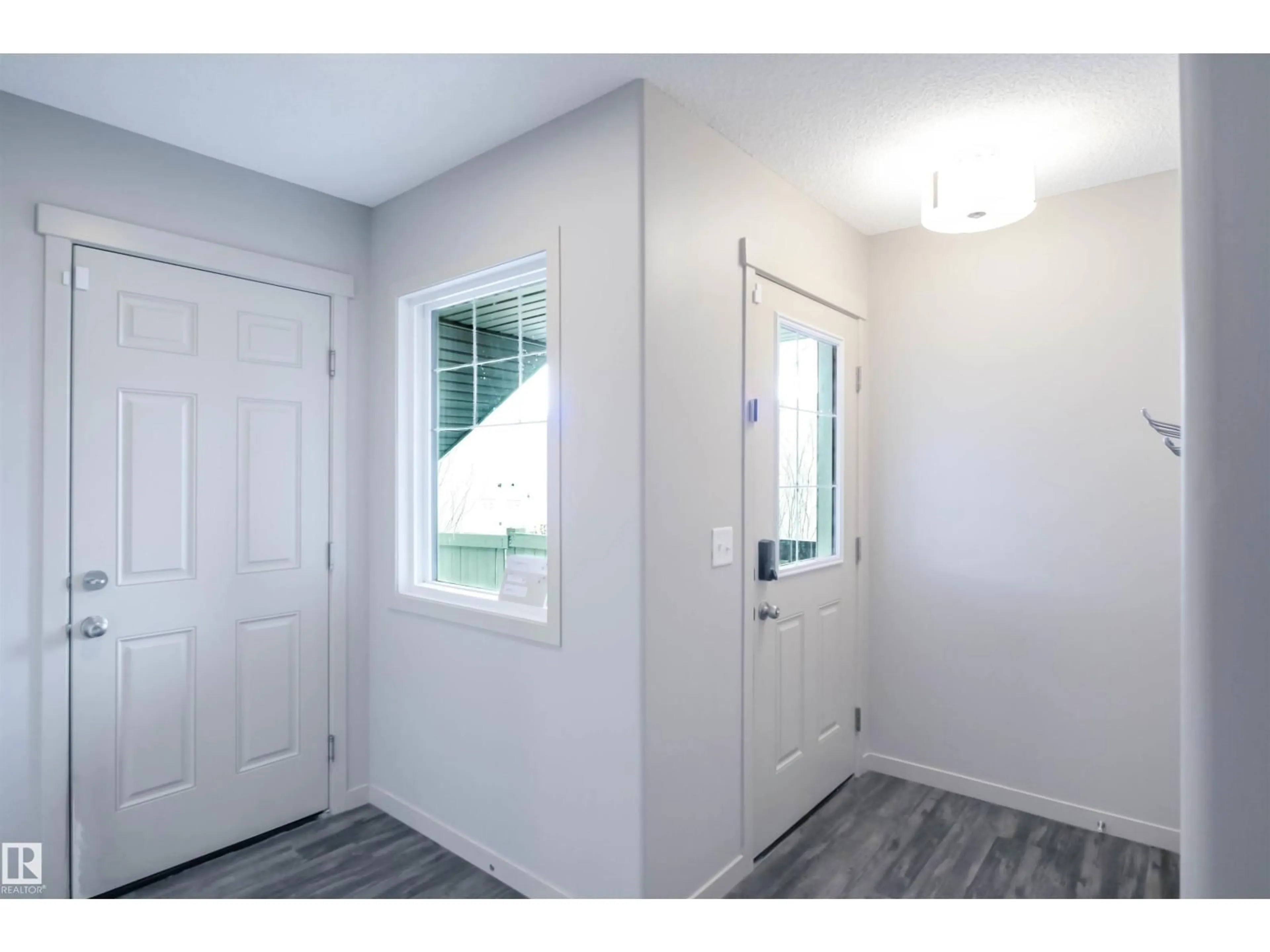 Indoor entryway for 1426 25 AV, Edmonton Alberta T6T2E2