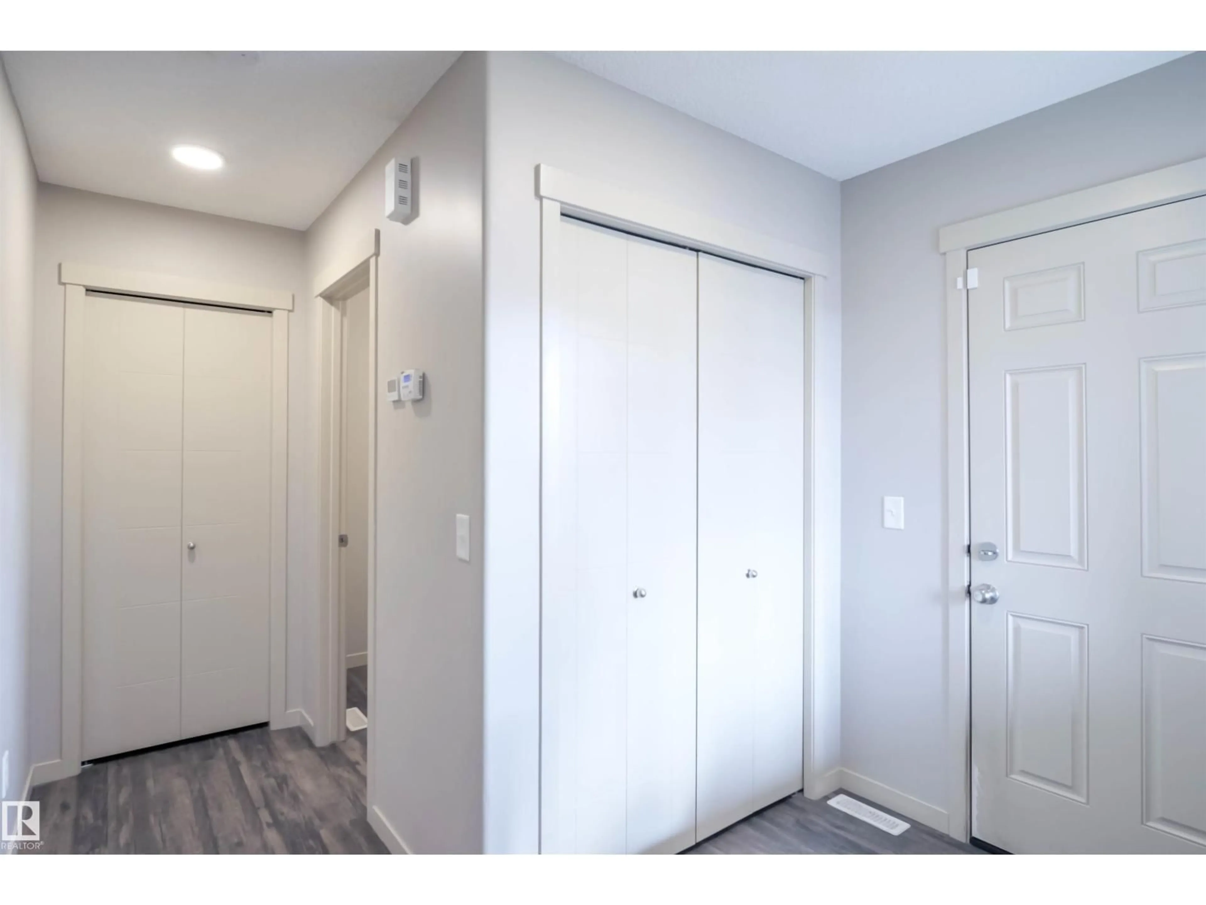 Indoor entryway for 1426 25 AV, Edmonton Alberta T6T2E2