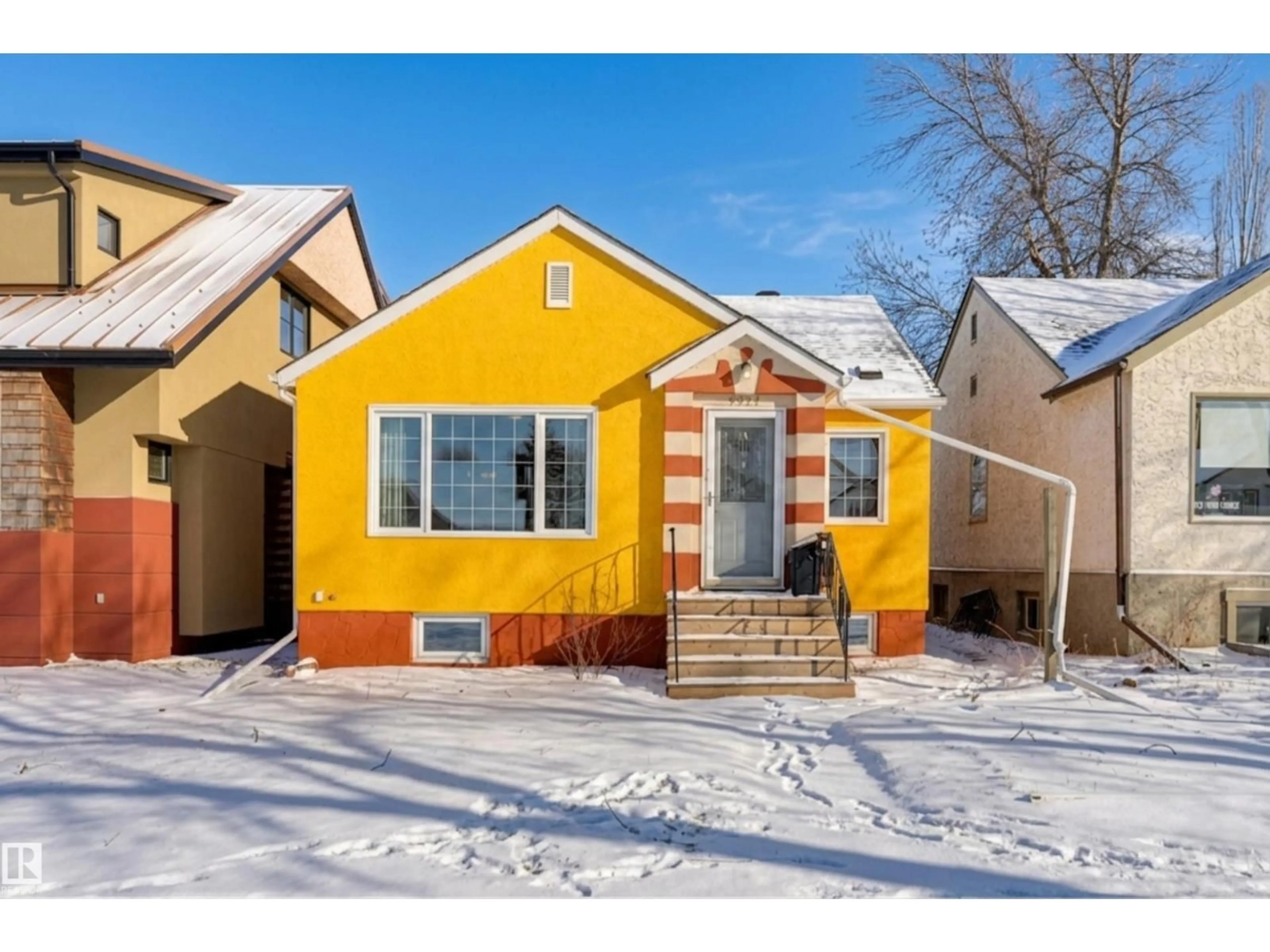 Home with brick exterior material, street for NW - 9827 84 AV, Edmonton Alberta T6E2G1