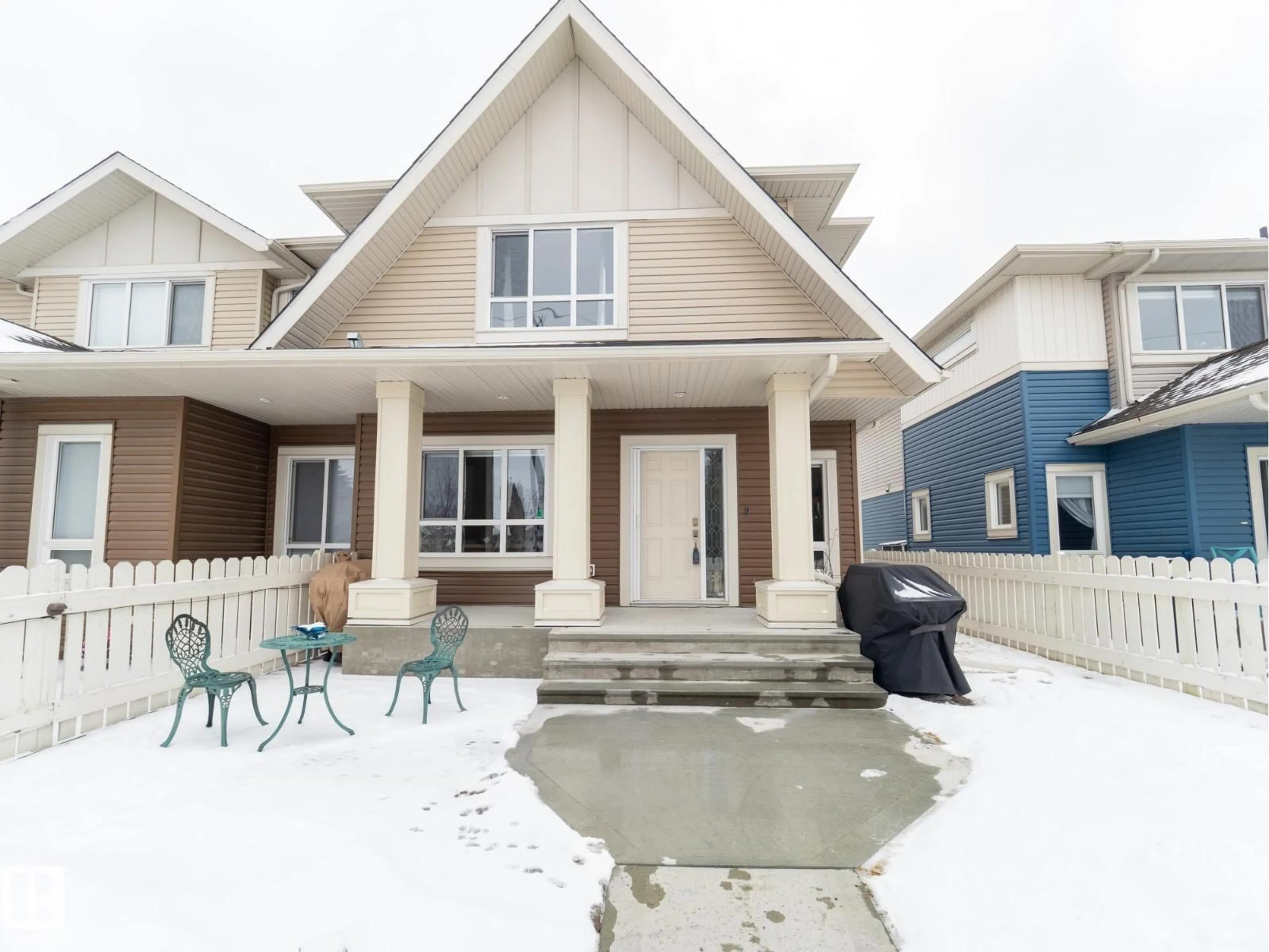 Home with vinyl exterior material, street for NW - 13035 132 AV, Edmonton Alberta T5L3R2