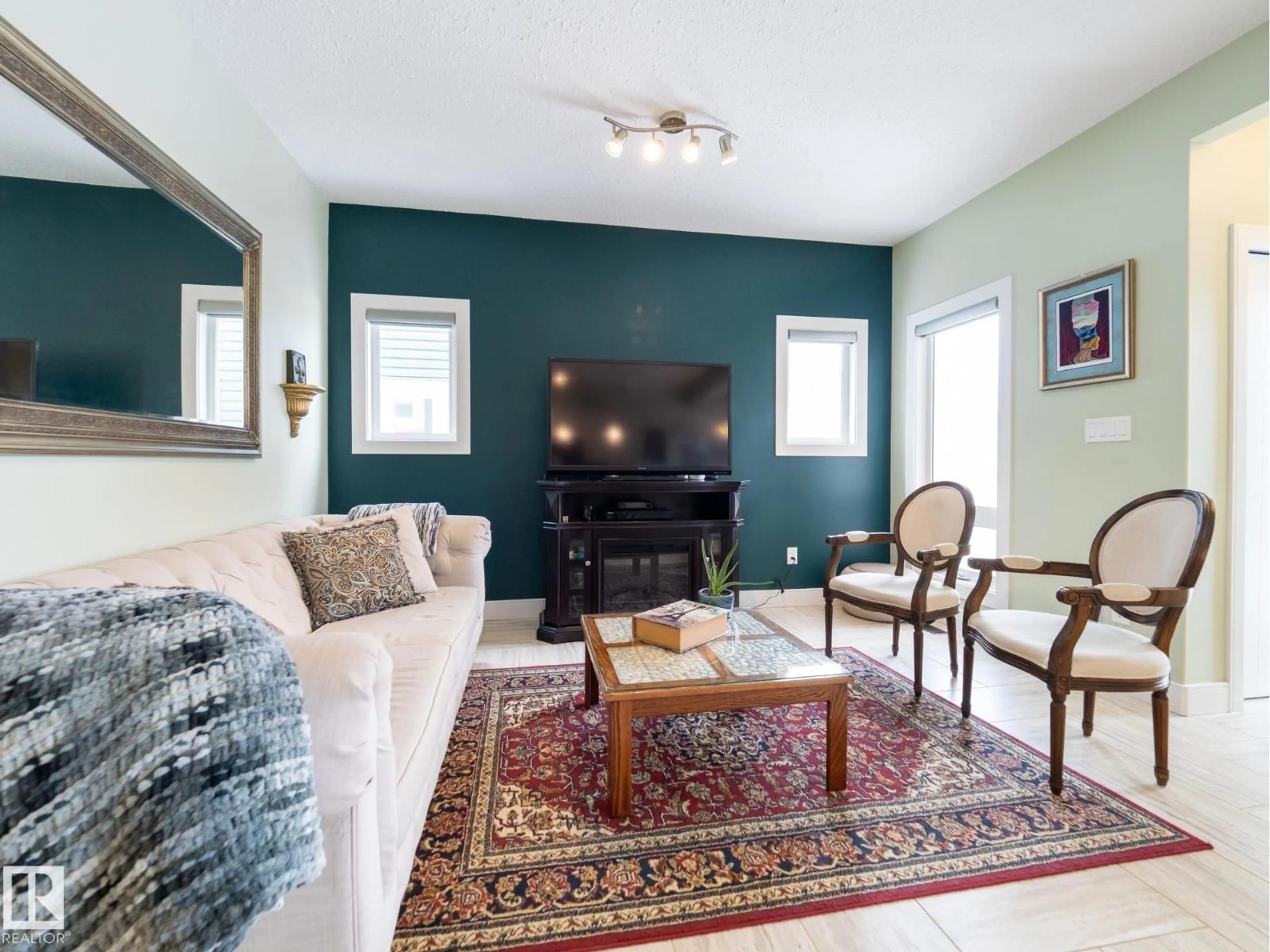 Living room with furniture, unknown for NW - 13035 132 AV, Edmonton Alberta T5L3R2