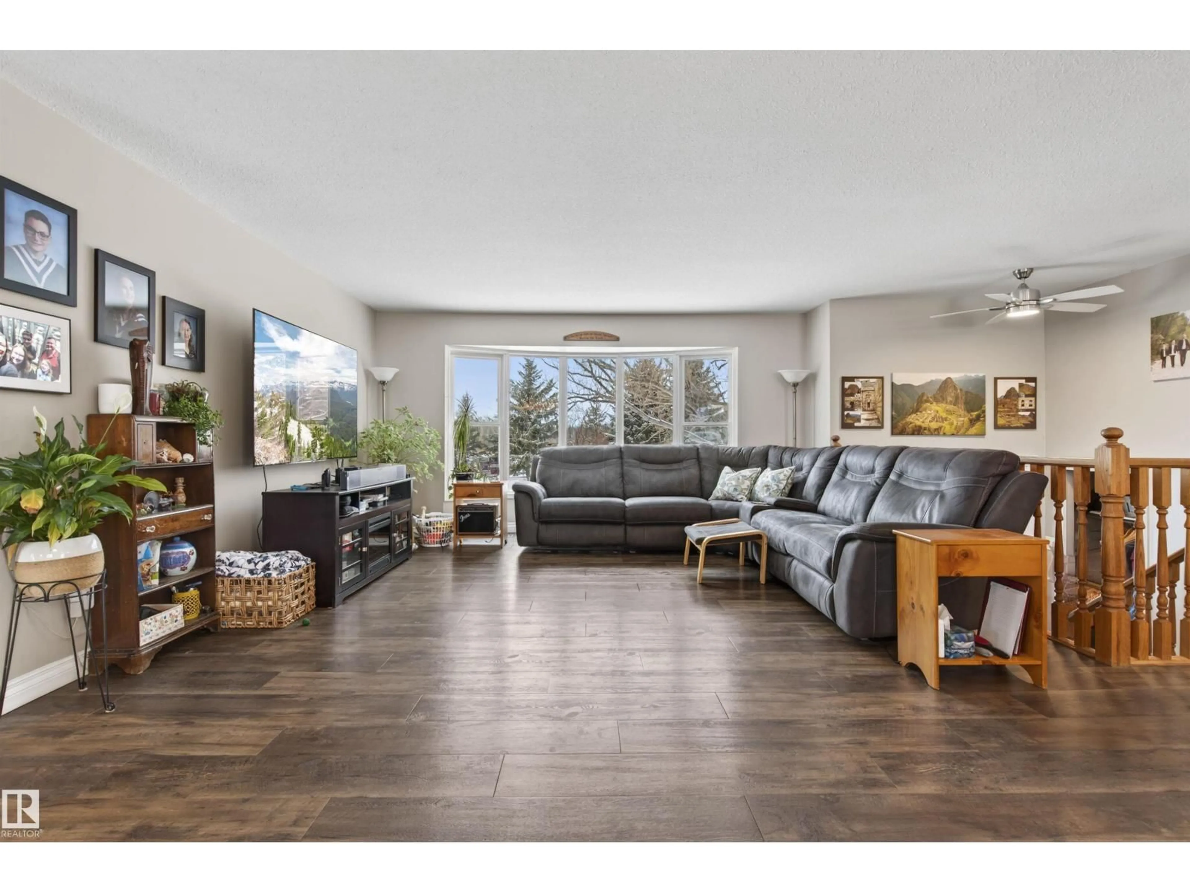 Living room with furniture, wood/laminate floor for 5803 53 AV, Cold Lake Alberta T9M1C8