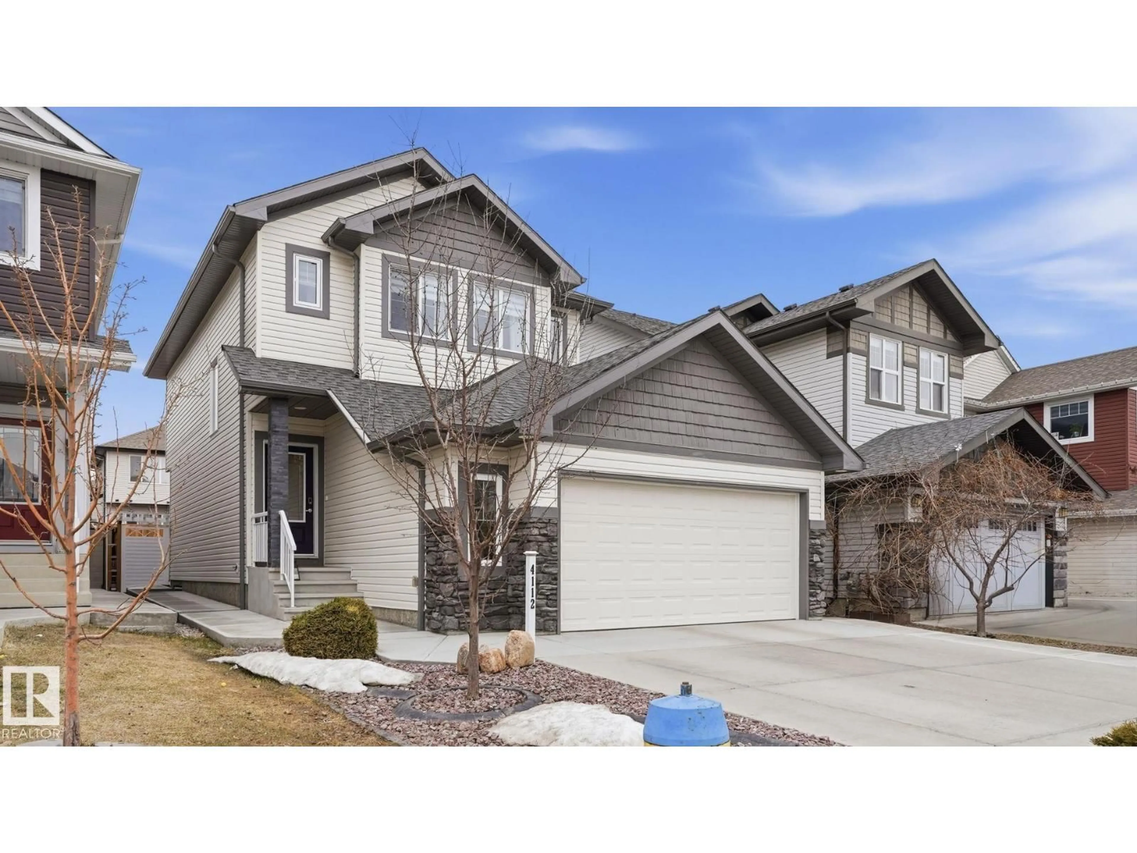 Home with vinyl exterior material, street for NW - 4112 171 AV, Edmonton Alberta T5Y0Z3