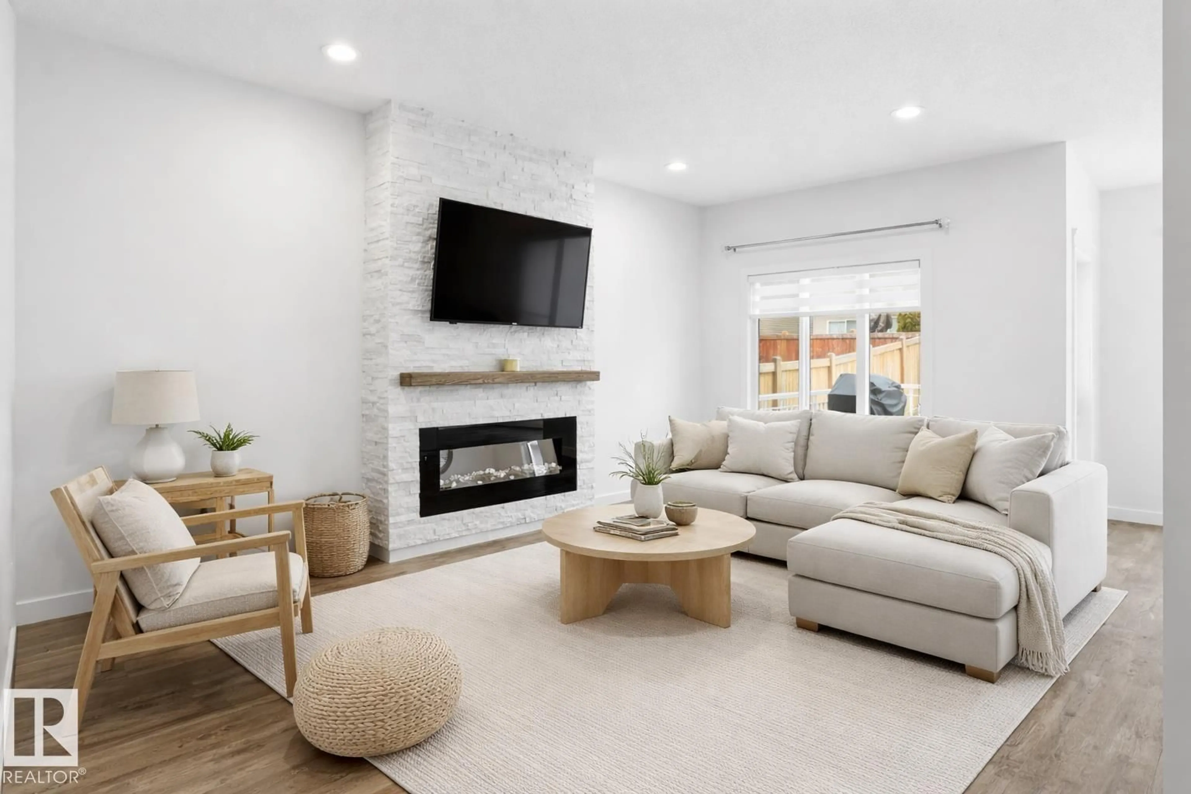 Living room with furniture, unknown for NW - 4112 171 AV, Edmonton Alberta T5Y0Z3