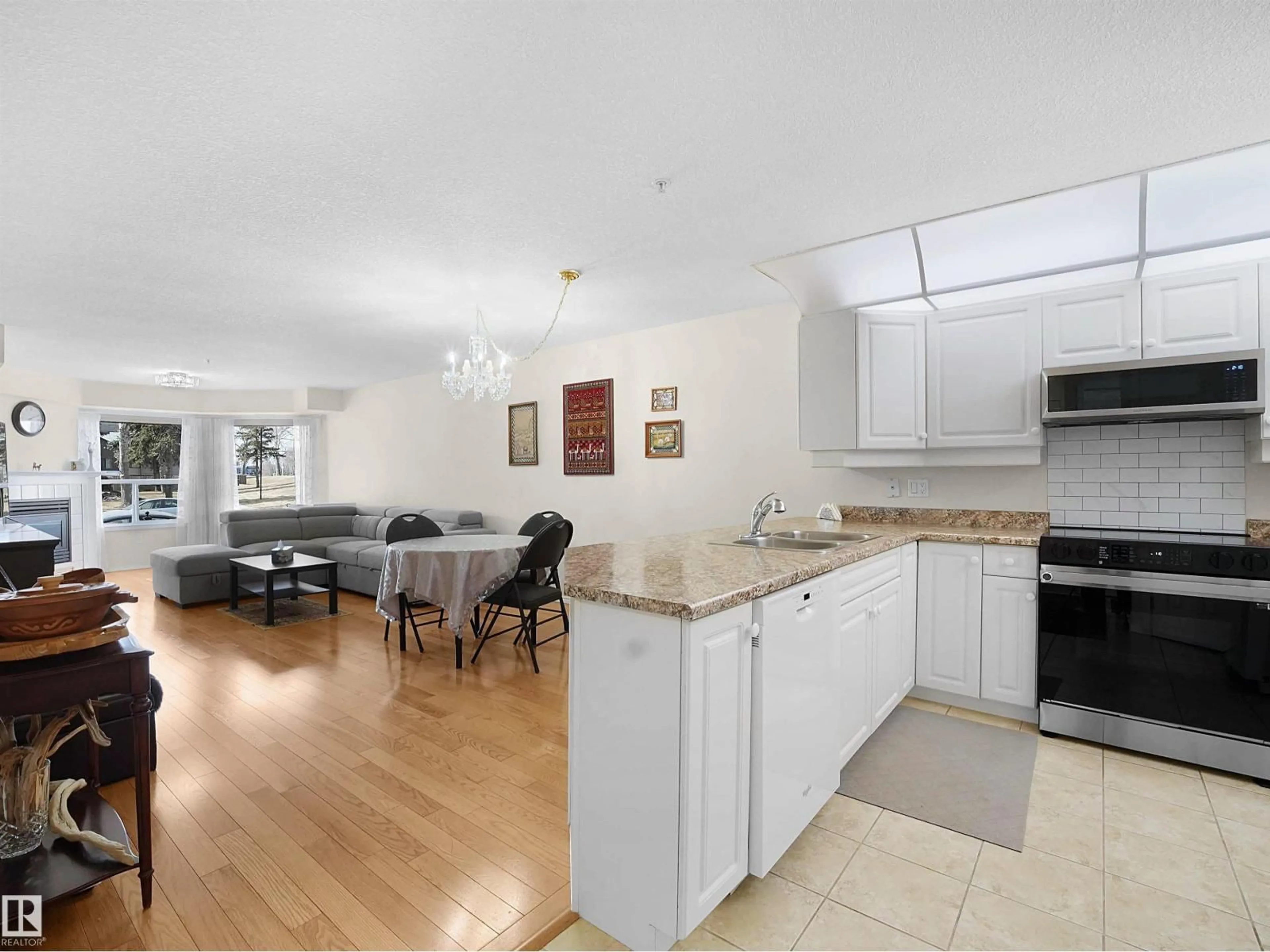 Open concept kitchen, unknown for #103 - 6703 172 ST, Edmonton Alberta T5T6H9